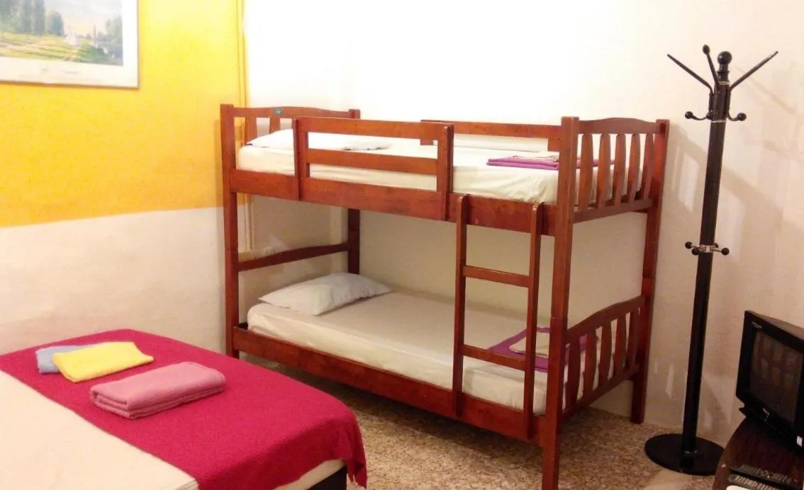 Bed in Cocoa Mews Cafe and Homestay