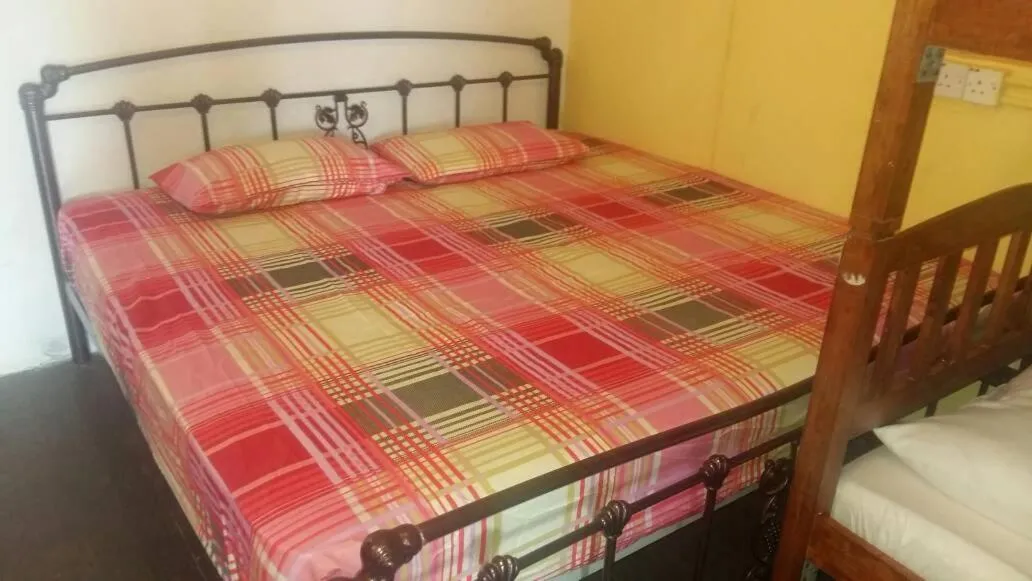 Bed in Cocoa Mews Cafe and Homestay