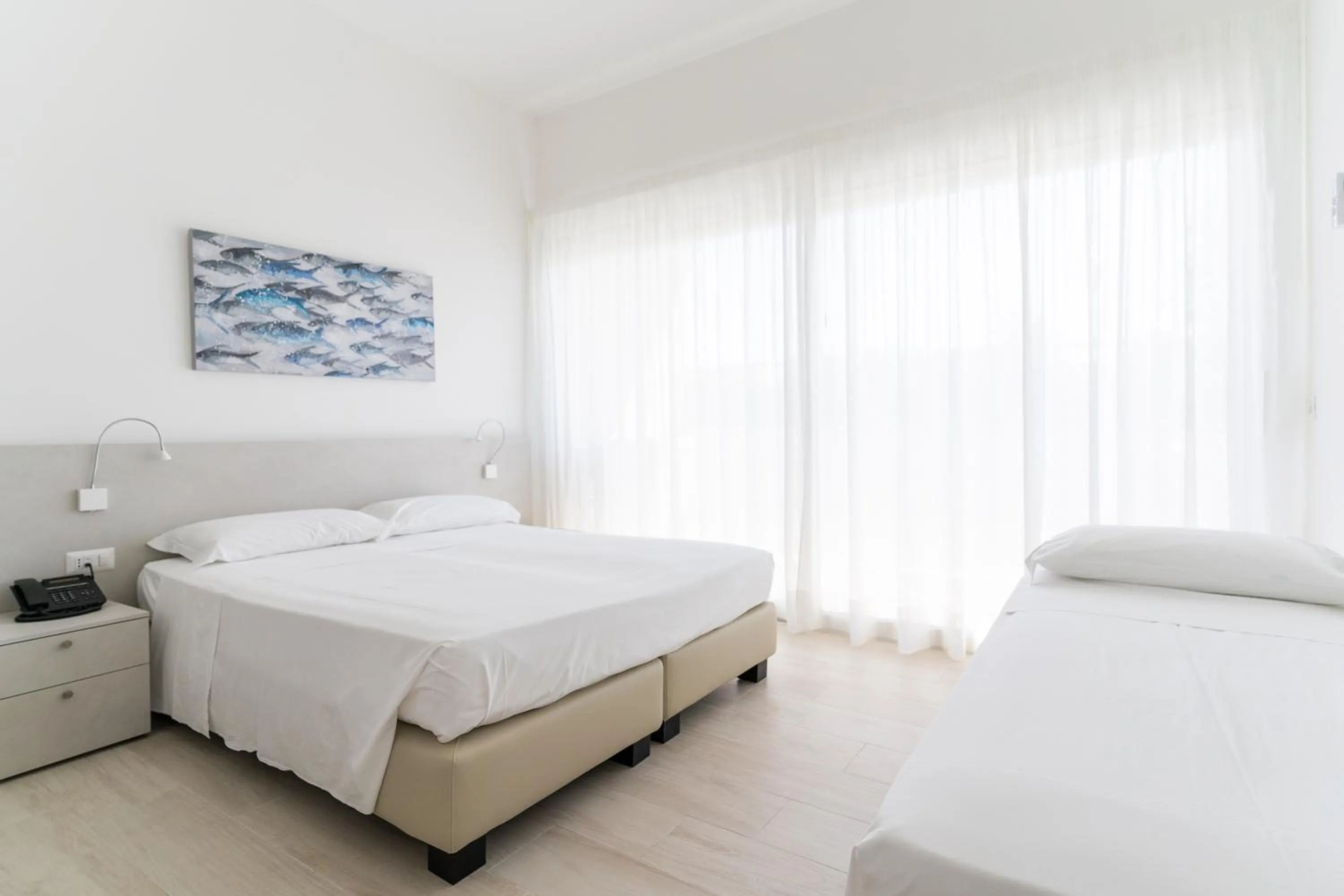 Bed in Residenza Turistica Alberghiera Blue Marine