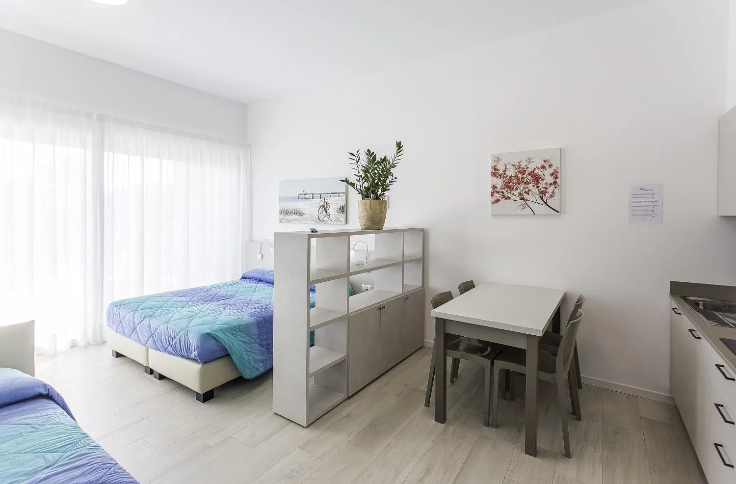 Living room, Bed in Residenza Turistica Alberghiera Blue Marine