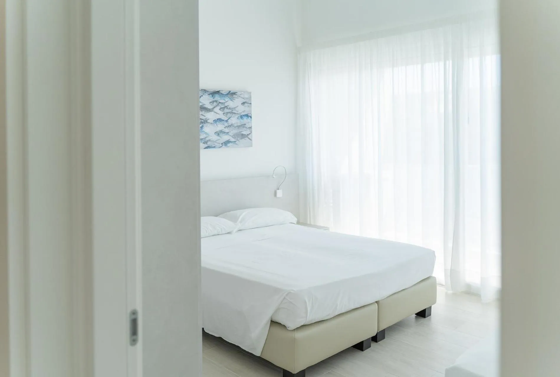 Bed in Residenza Turistica Alberghiera Blue Marine