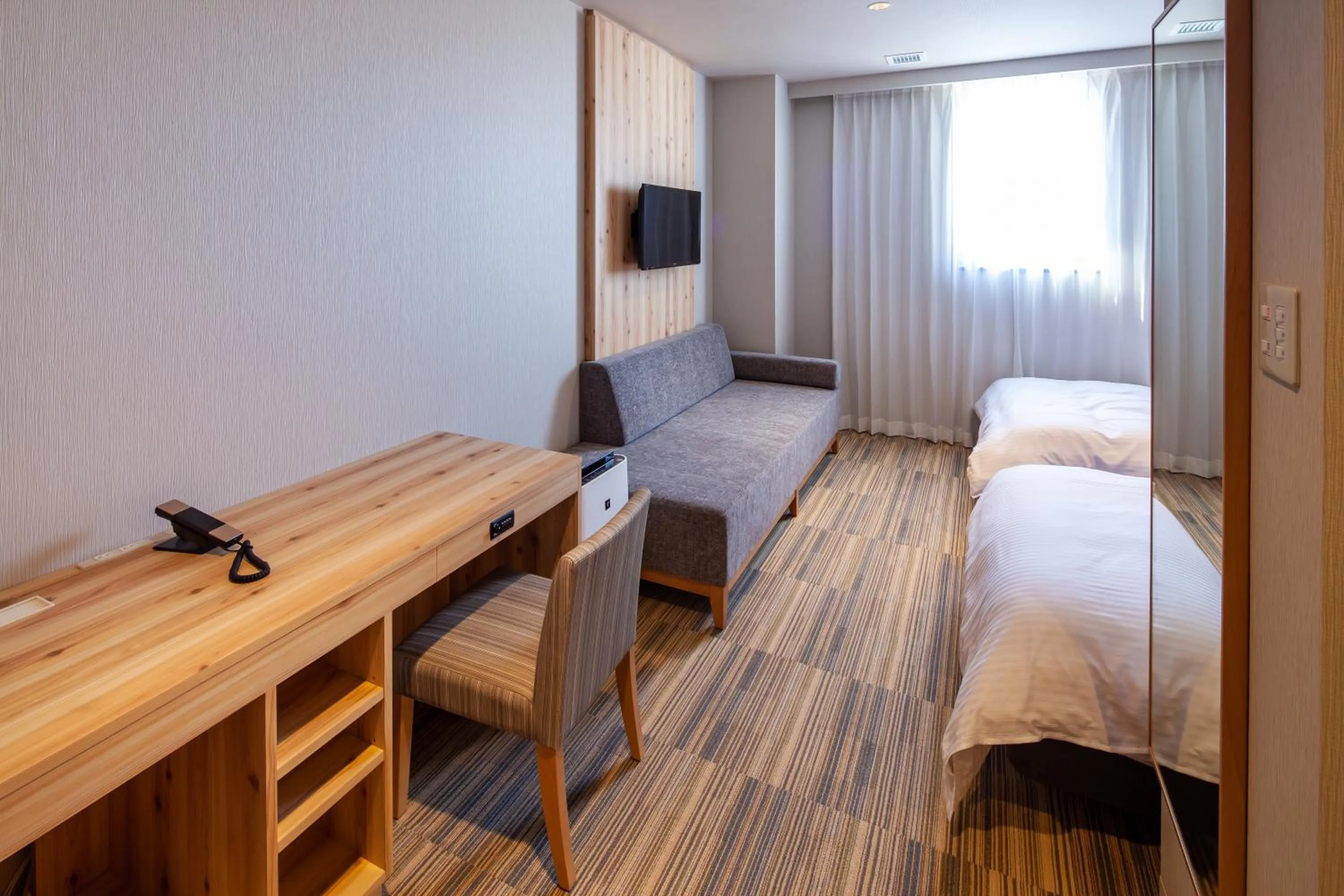 Photo of the whole room, Bed in Y's CABIN&HOTEL Naha Kokusai Street