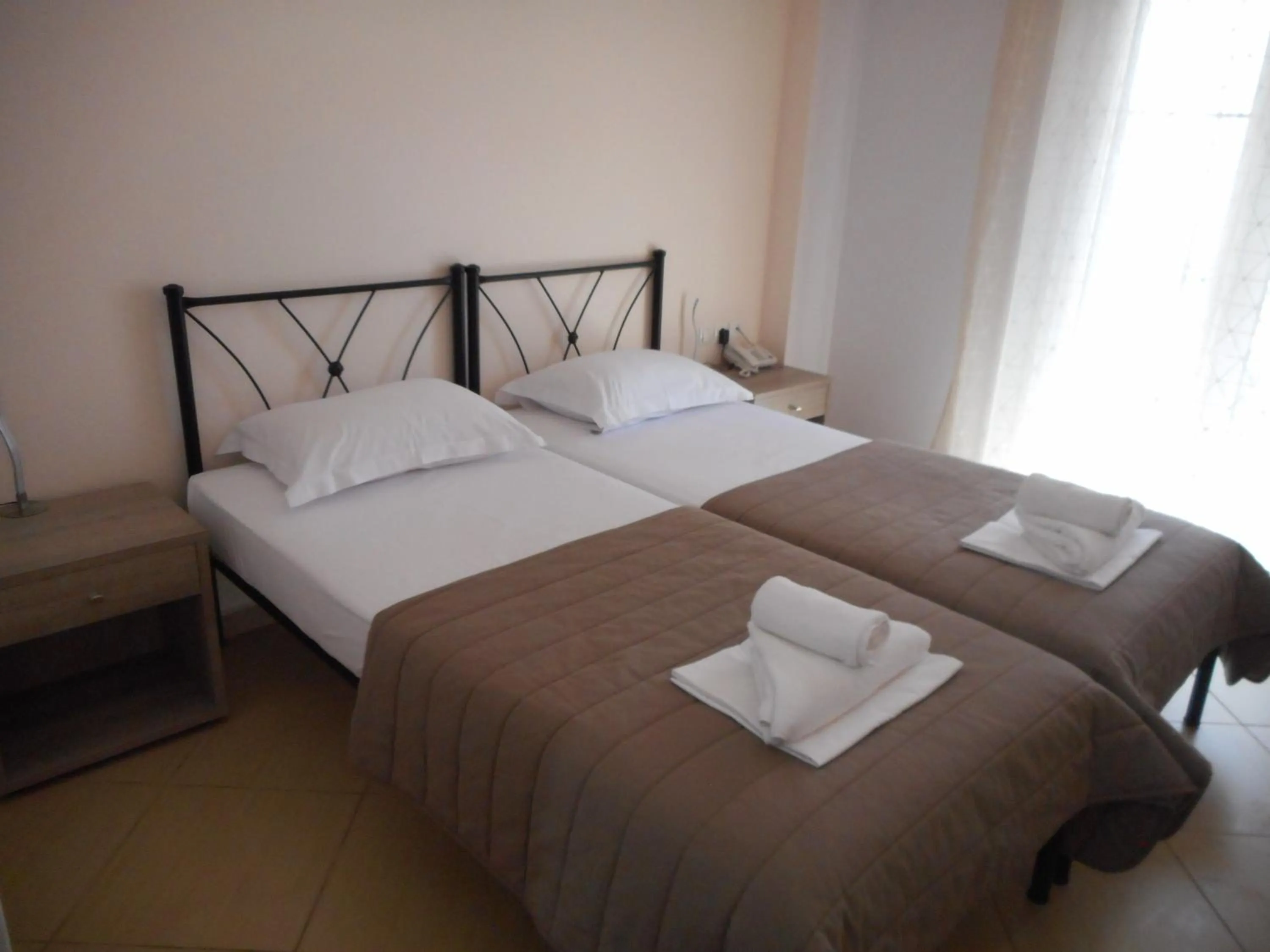 Bed in Anesis Hotel