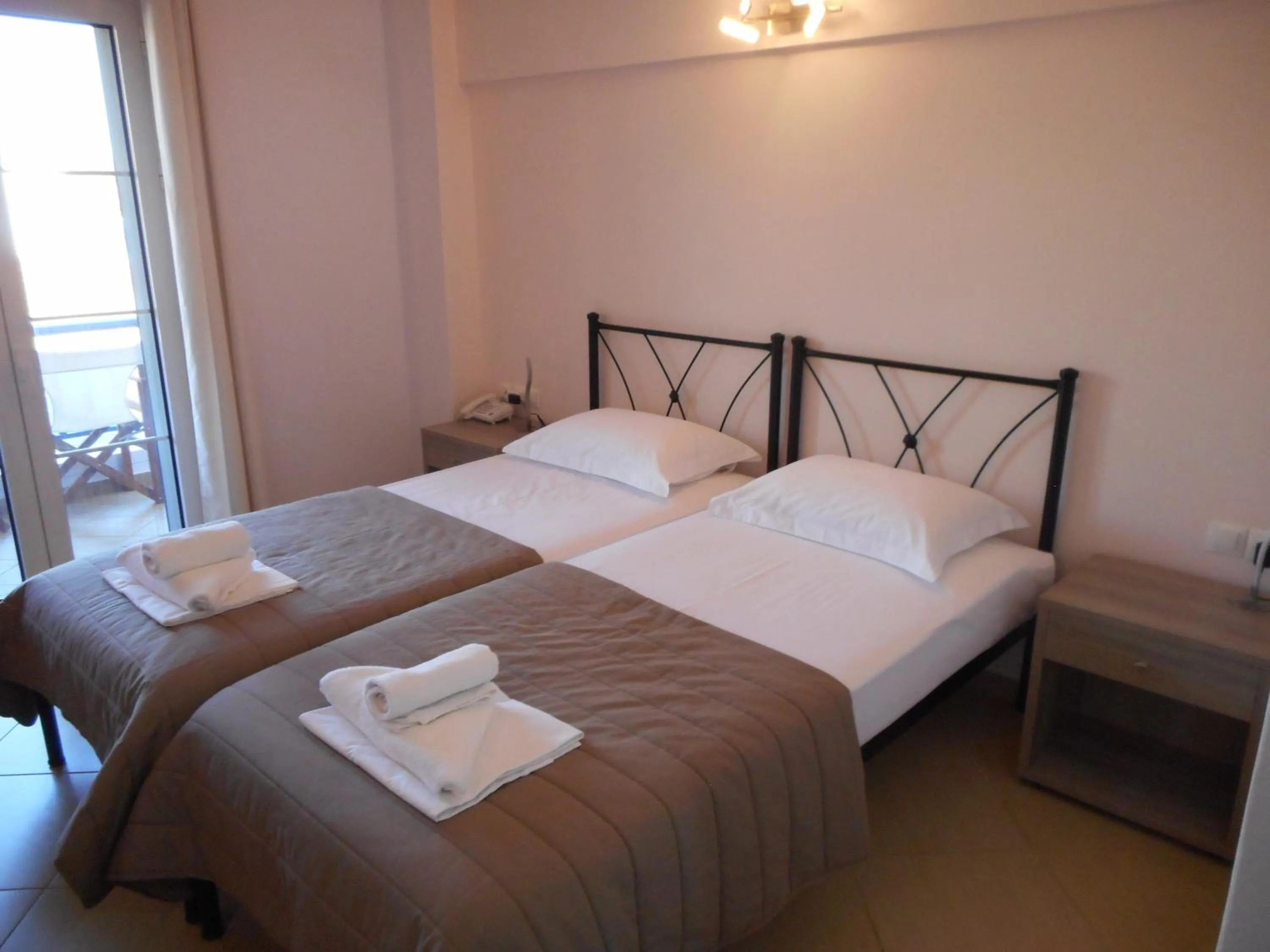 Bed in Anesis Hotel