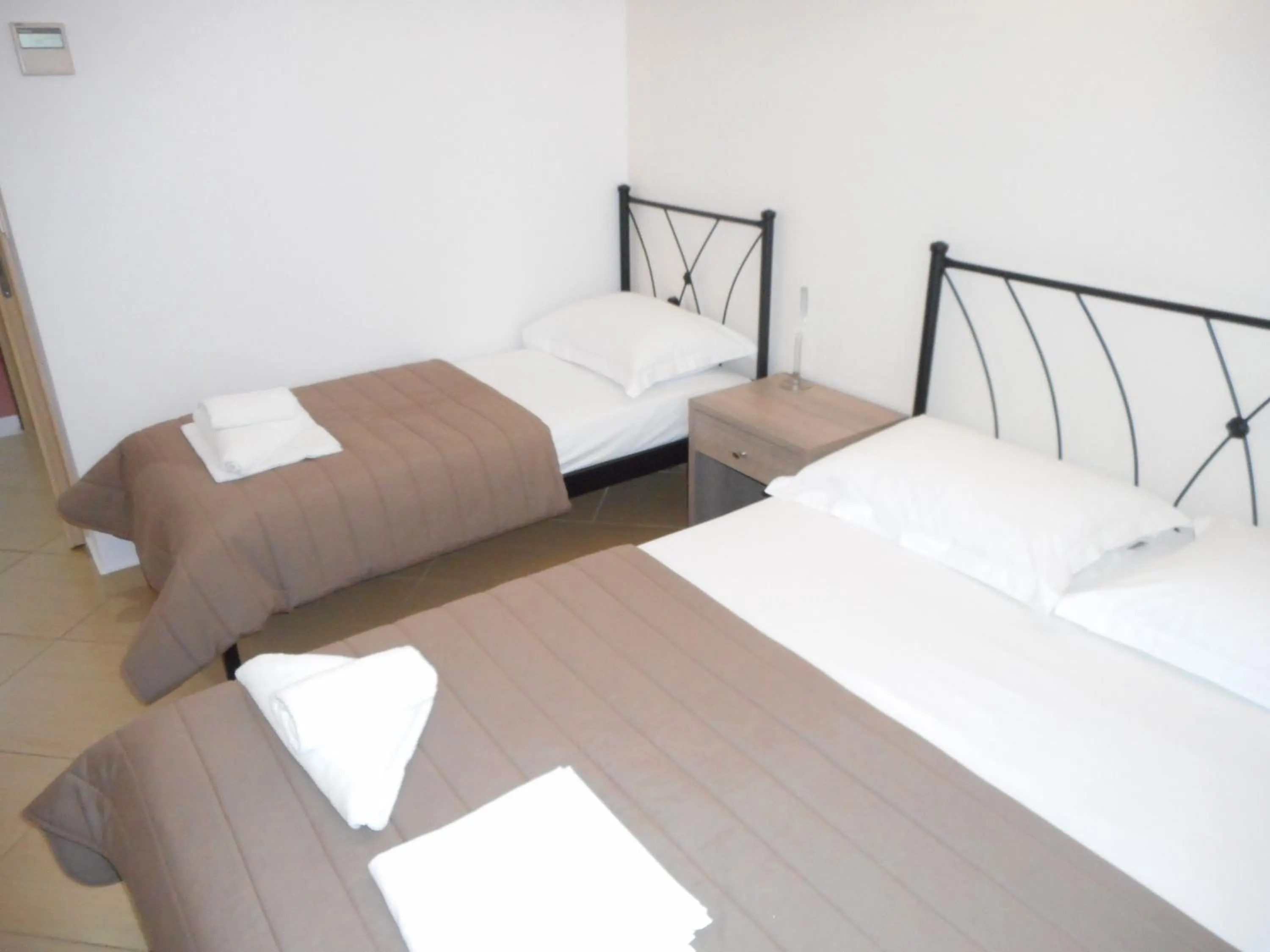Bed in Anesis Hotel
