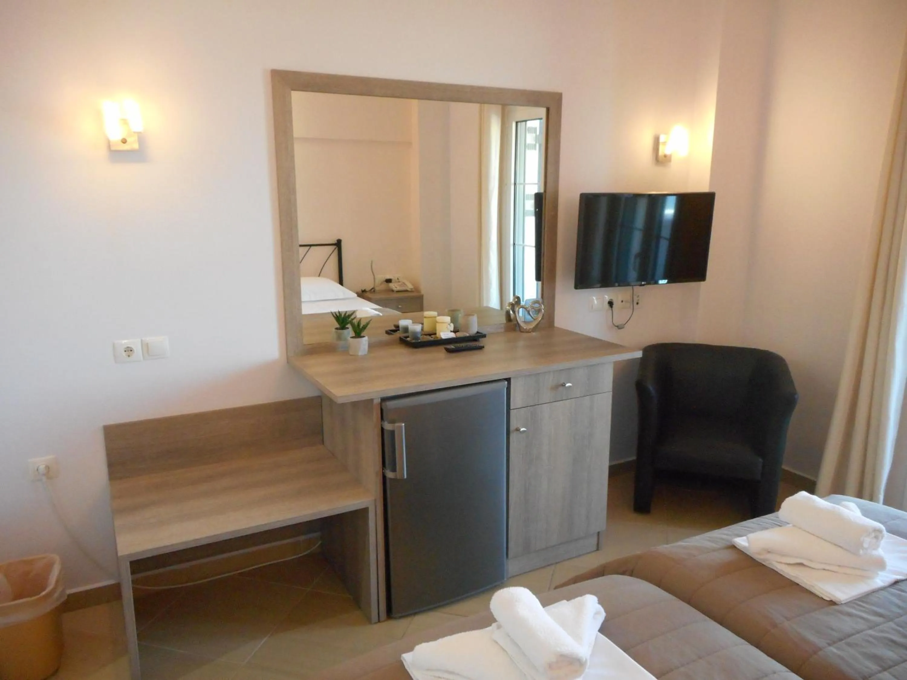 Bed in Anesis Hotel