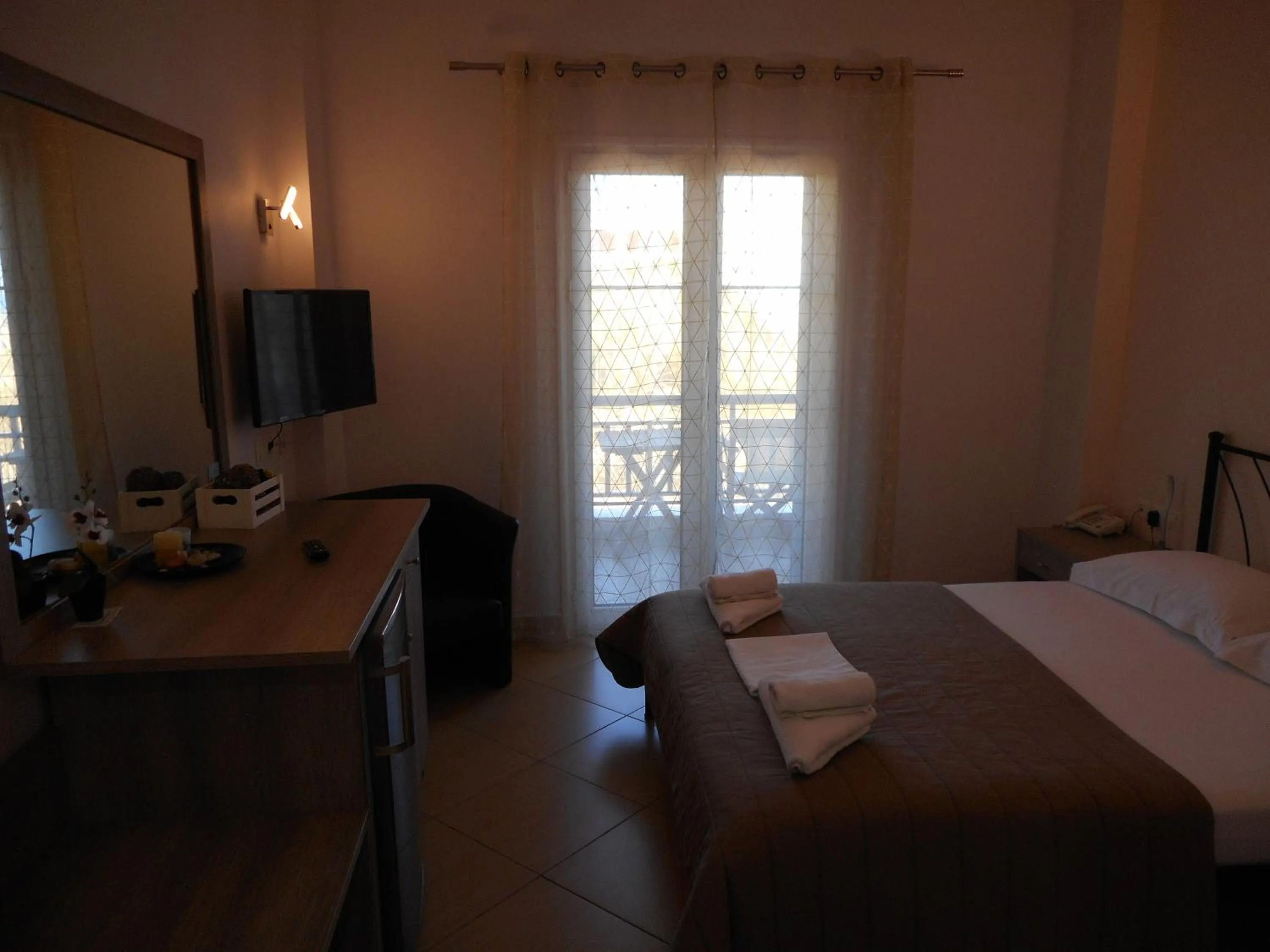 Bed in Anesis Hotel