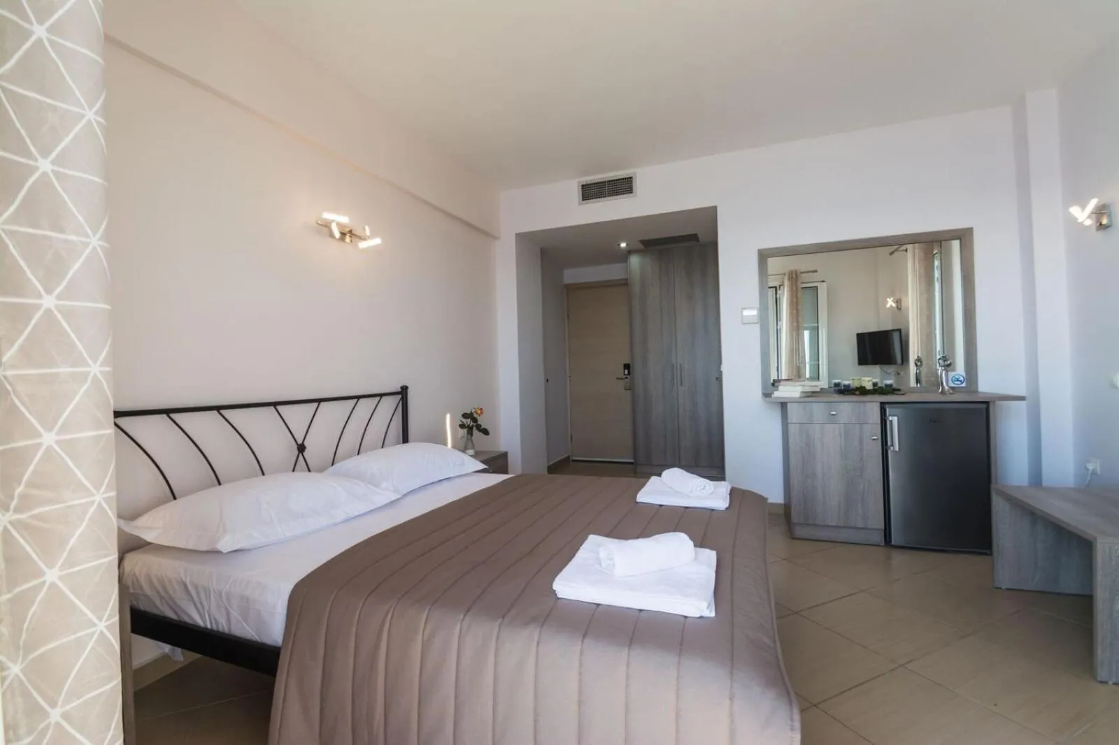 Bed in Anesis Hotel