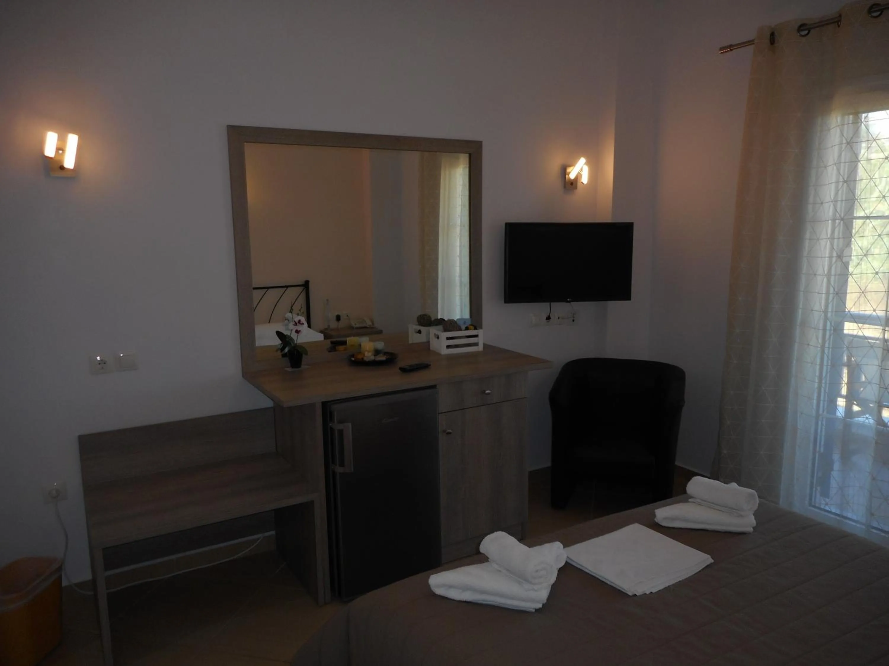 Bed in Anesis Hotel