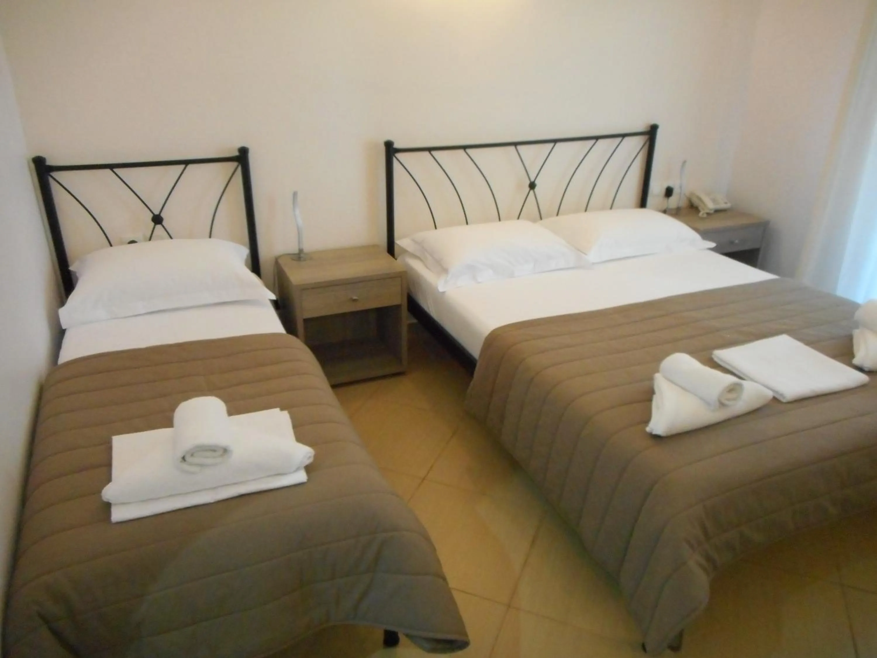 Bed in Anesis Hotel