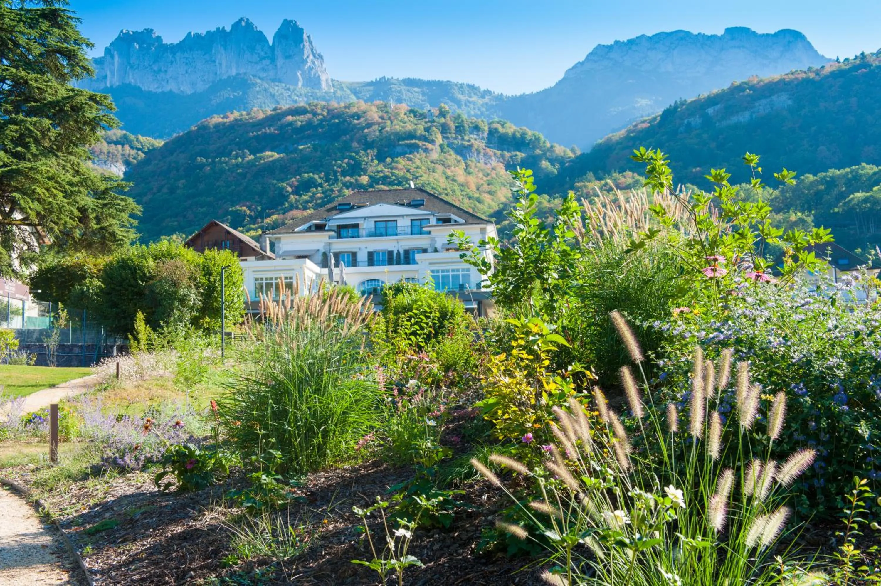 Garden view in Hôtel Beau Site Talloires B SPA