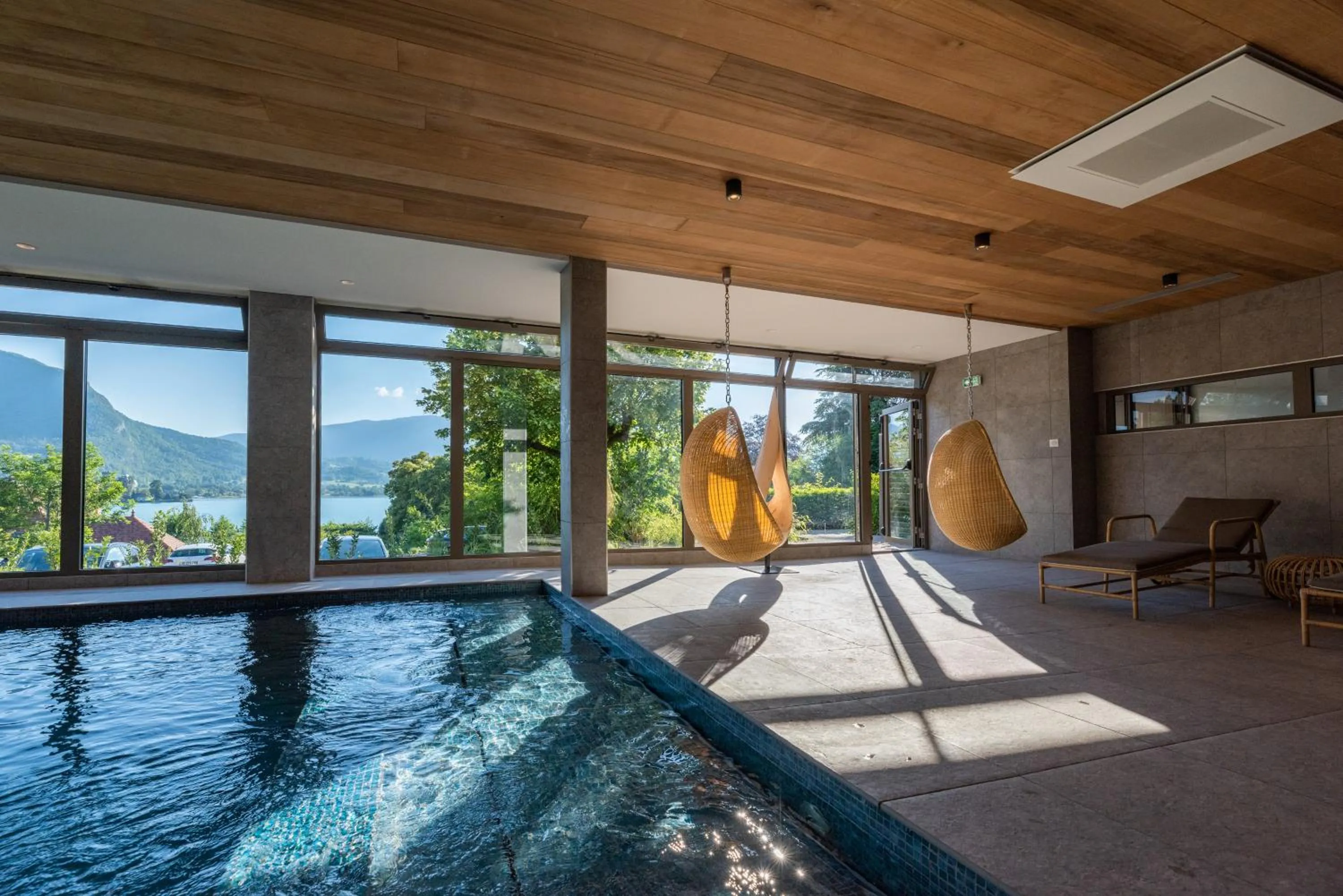 Swimming pool in Hôtel Beau Site Talloires B SPA