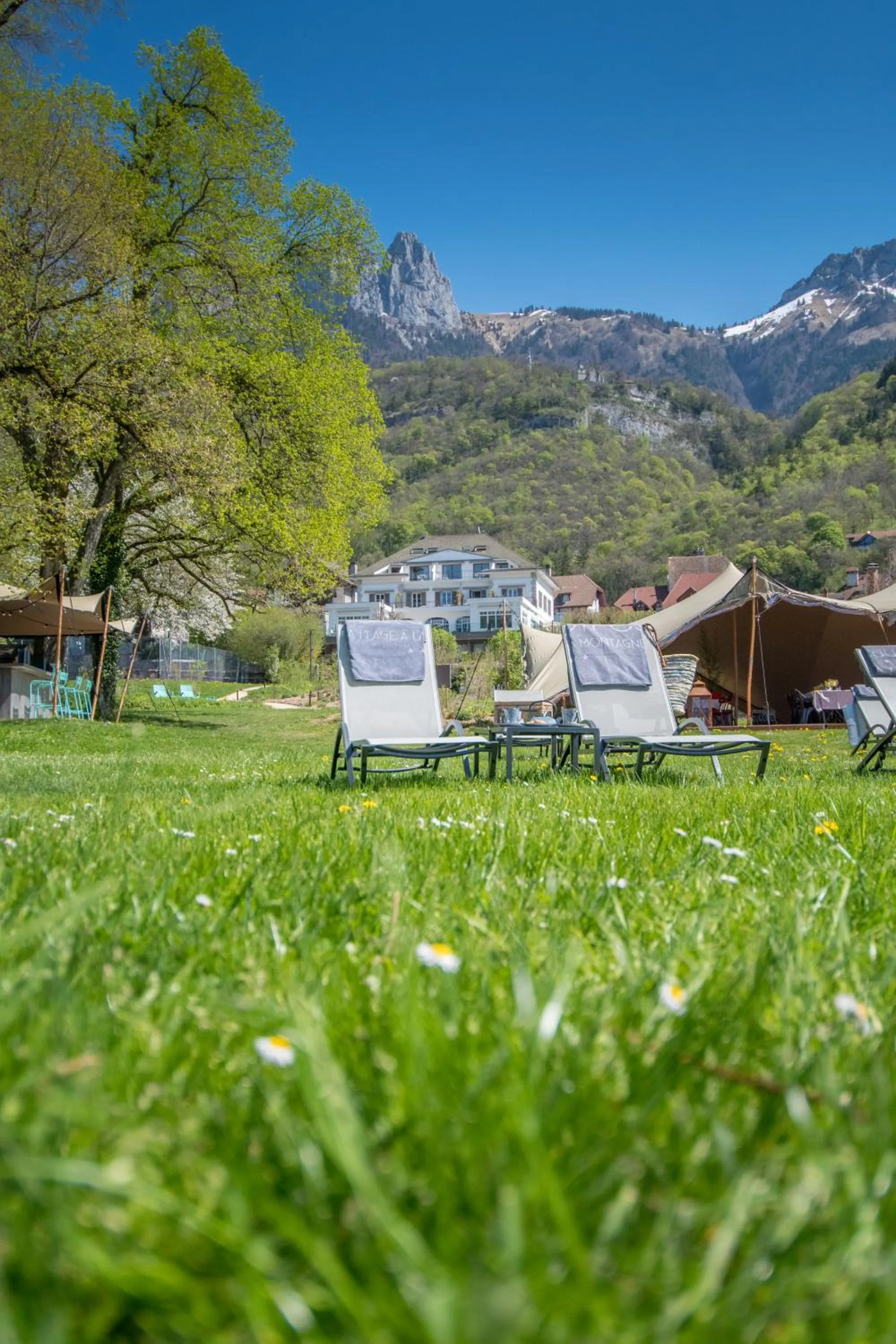 Garden view in Hôtel Beau Site Talloires B SPA