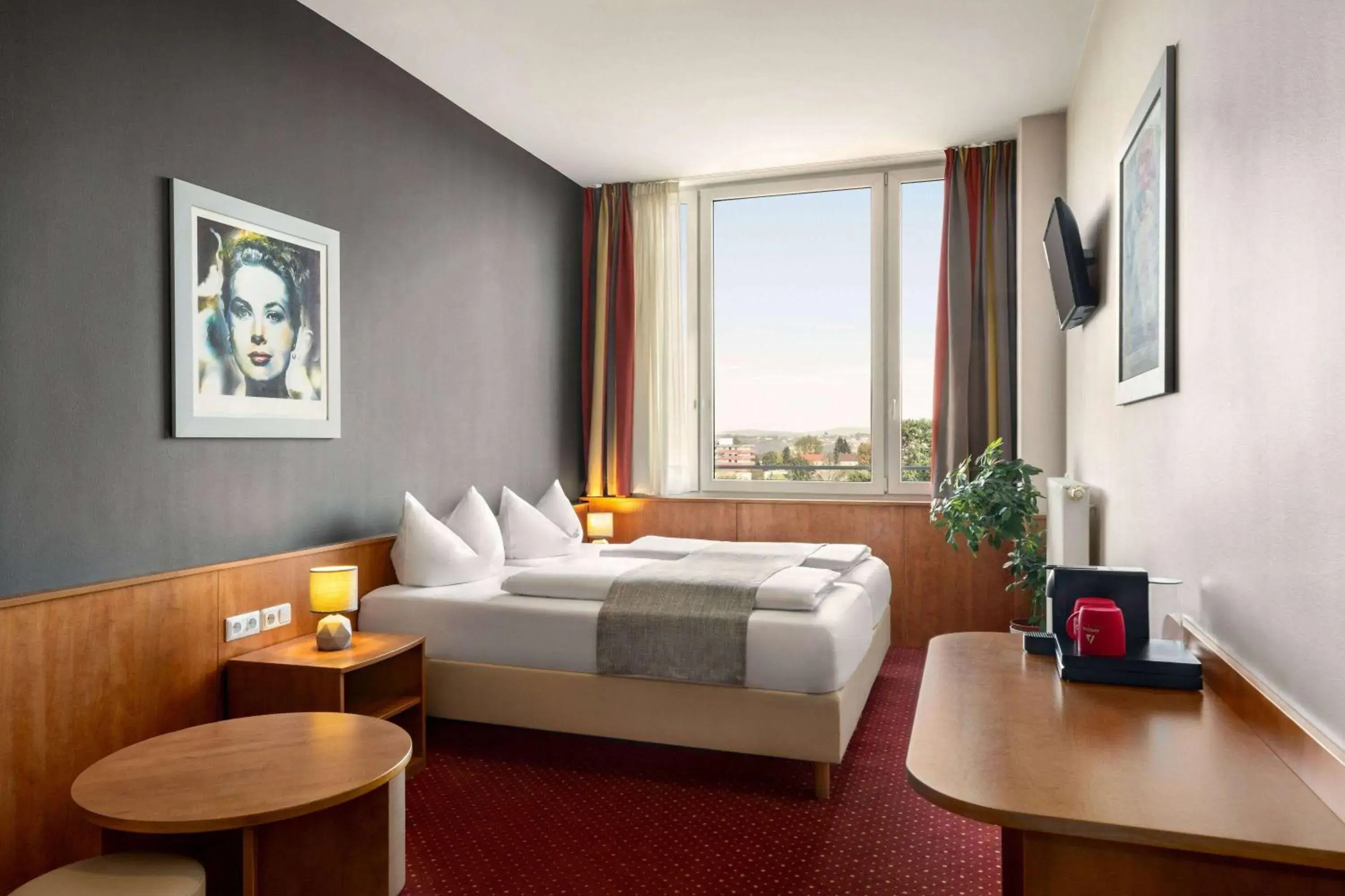 Photo of the whole room in Amedia Express Passau, Trademark Collection by Wyndham Photo of the whole room in Amedia Express Passau, Trademark Collection by Wyndham