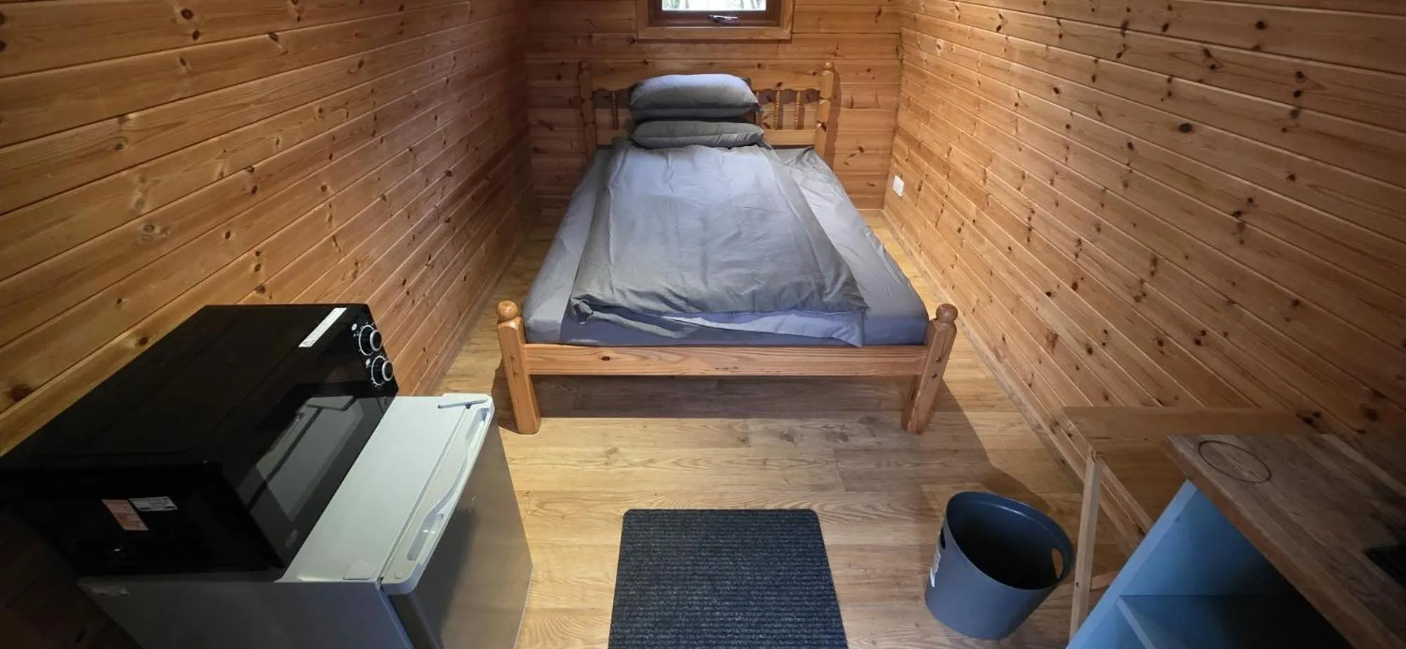 Bed in Wyreside Lakes Glamping Pods