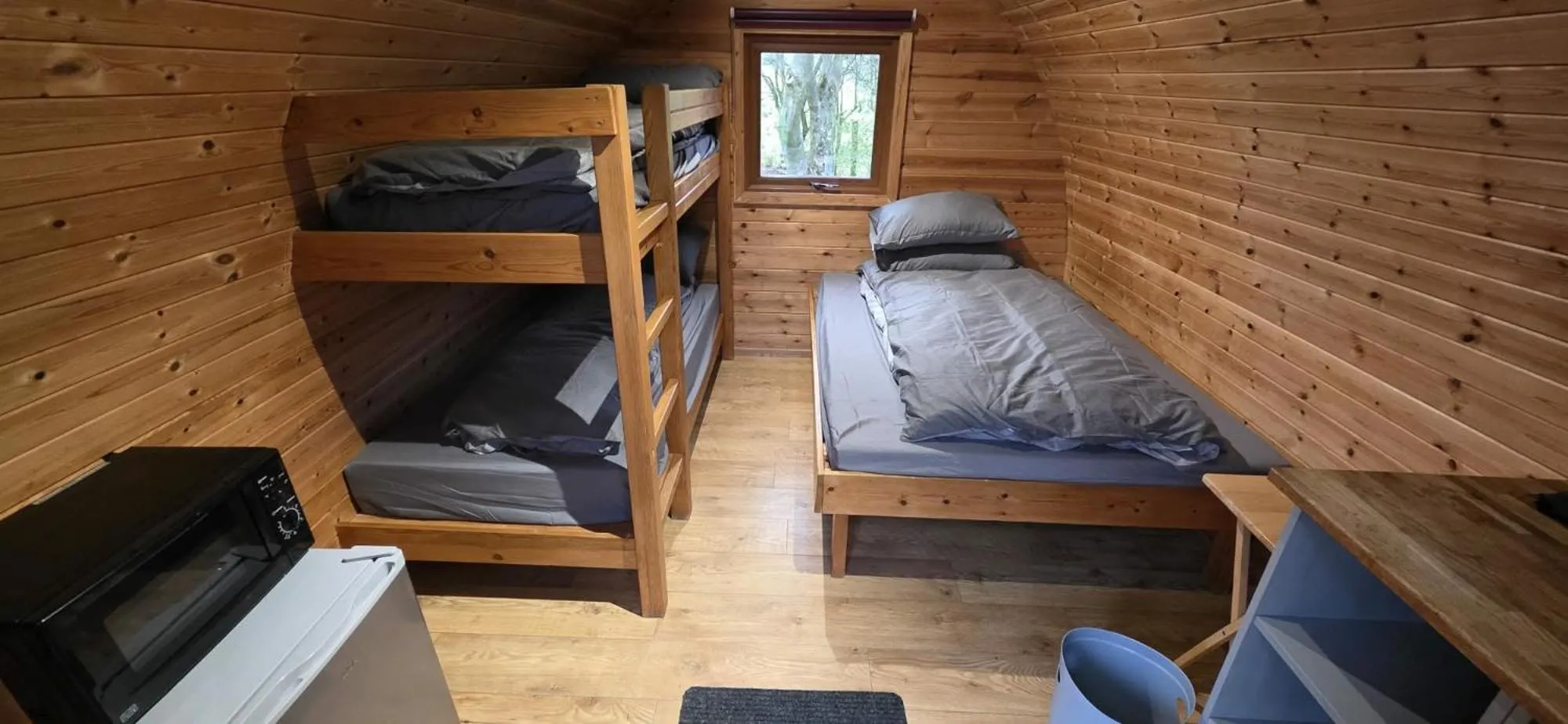 Bed in Wyreside Lakes Glamping Pods