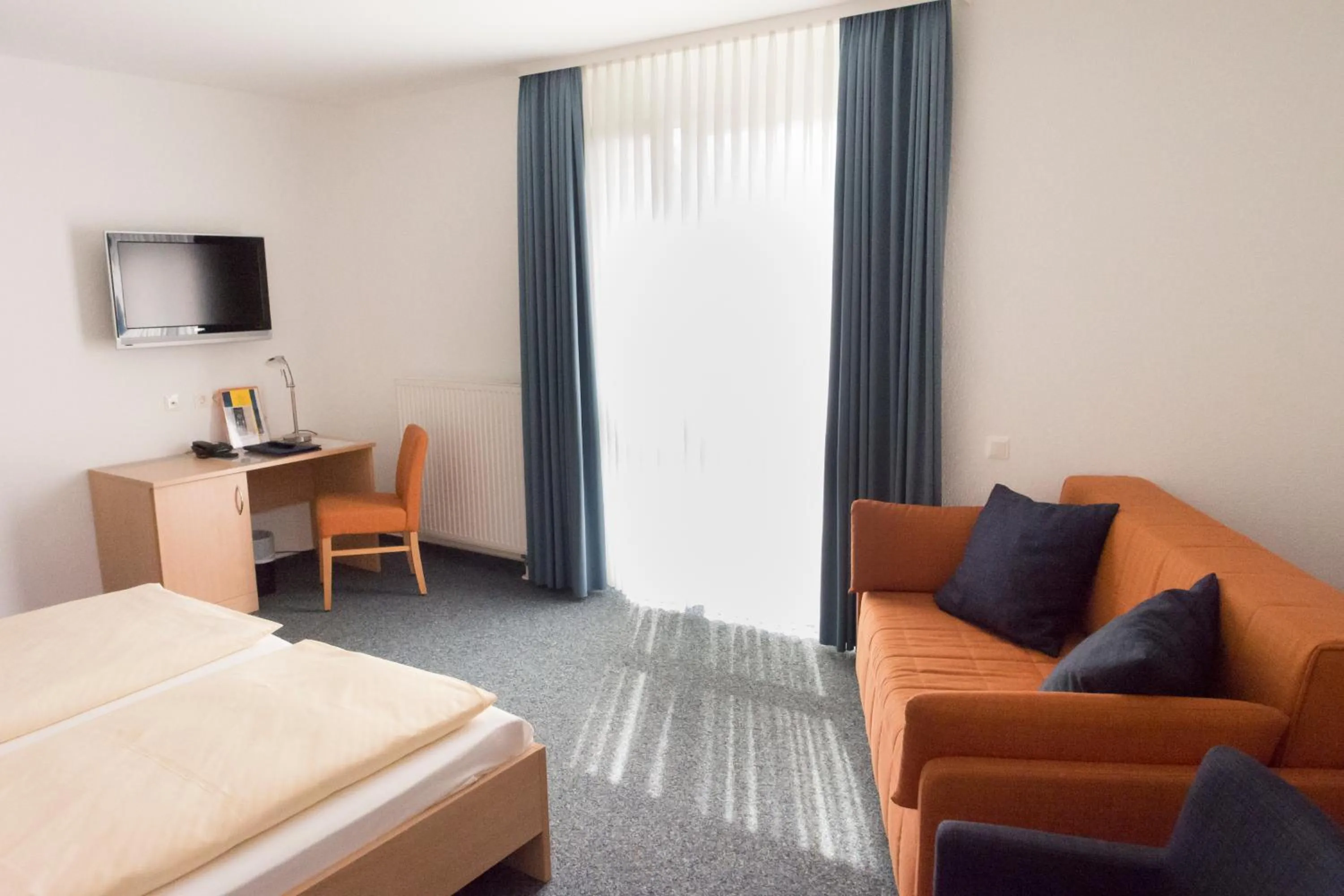 Photo of the whole room, Bed in Johanniter Gästehaus