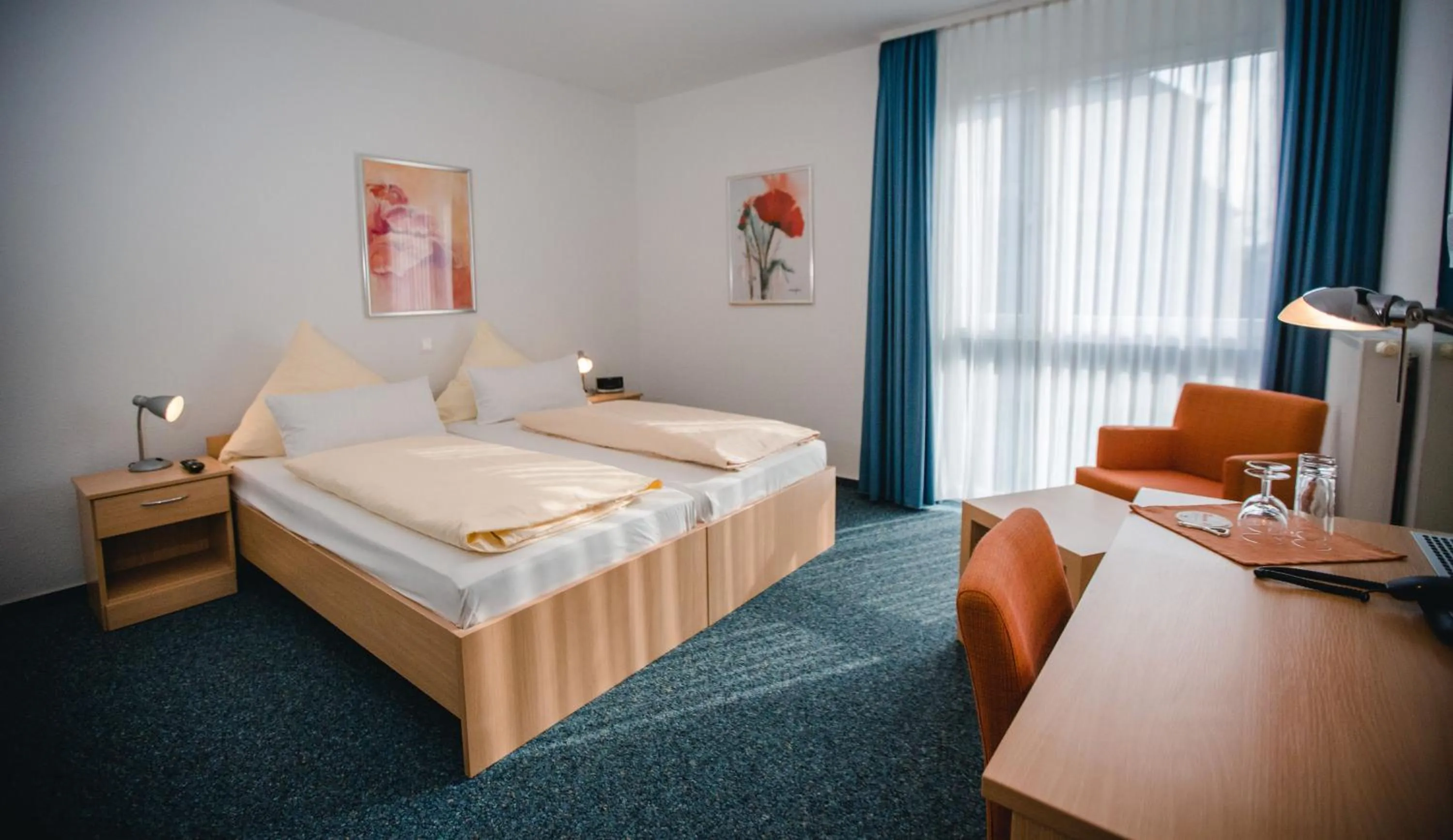 Photo of the whole room, Bed in Johanniter Gästehaus