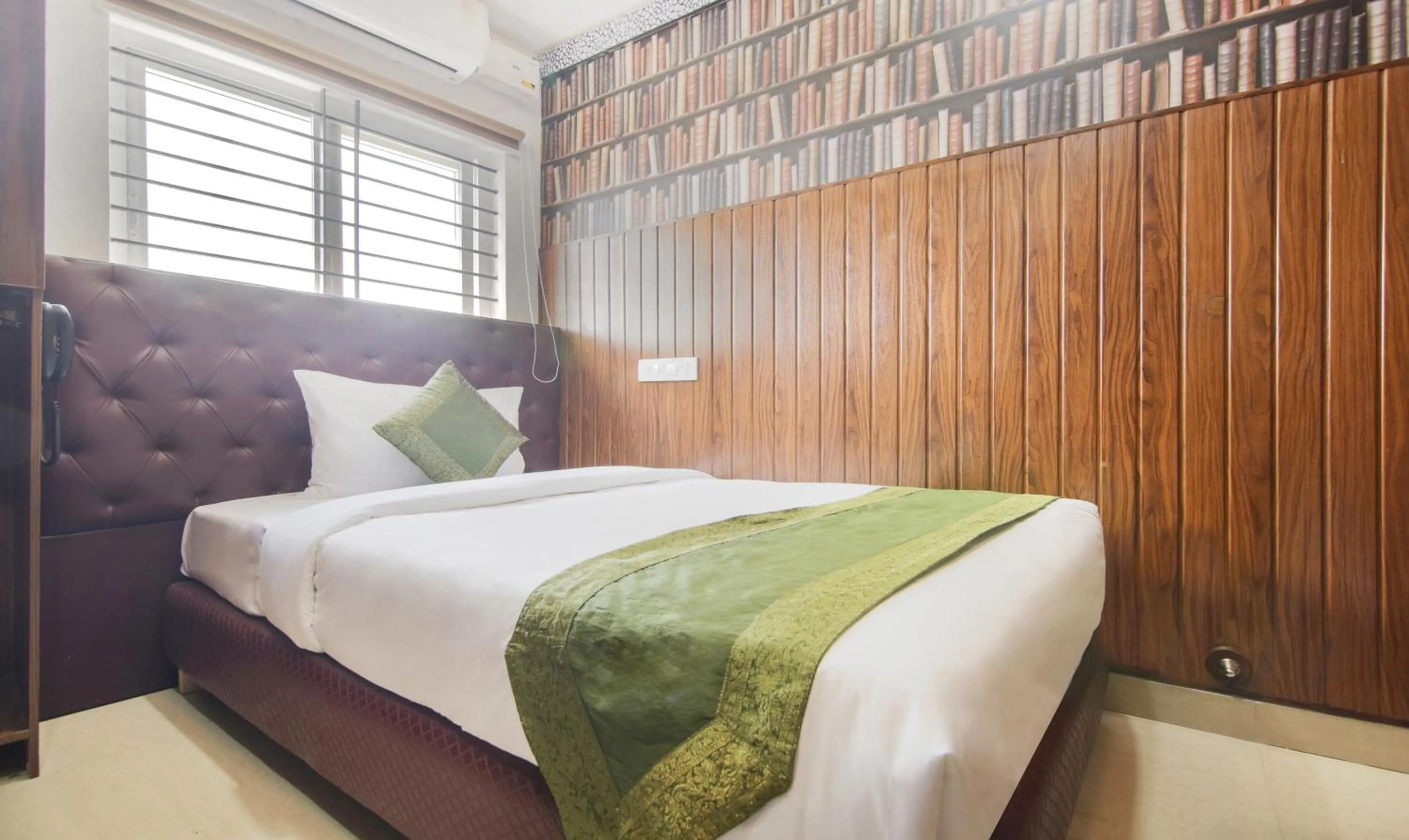 Bed in Hotel Dvaraka Inn