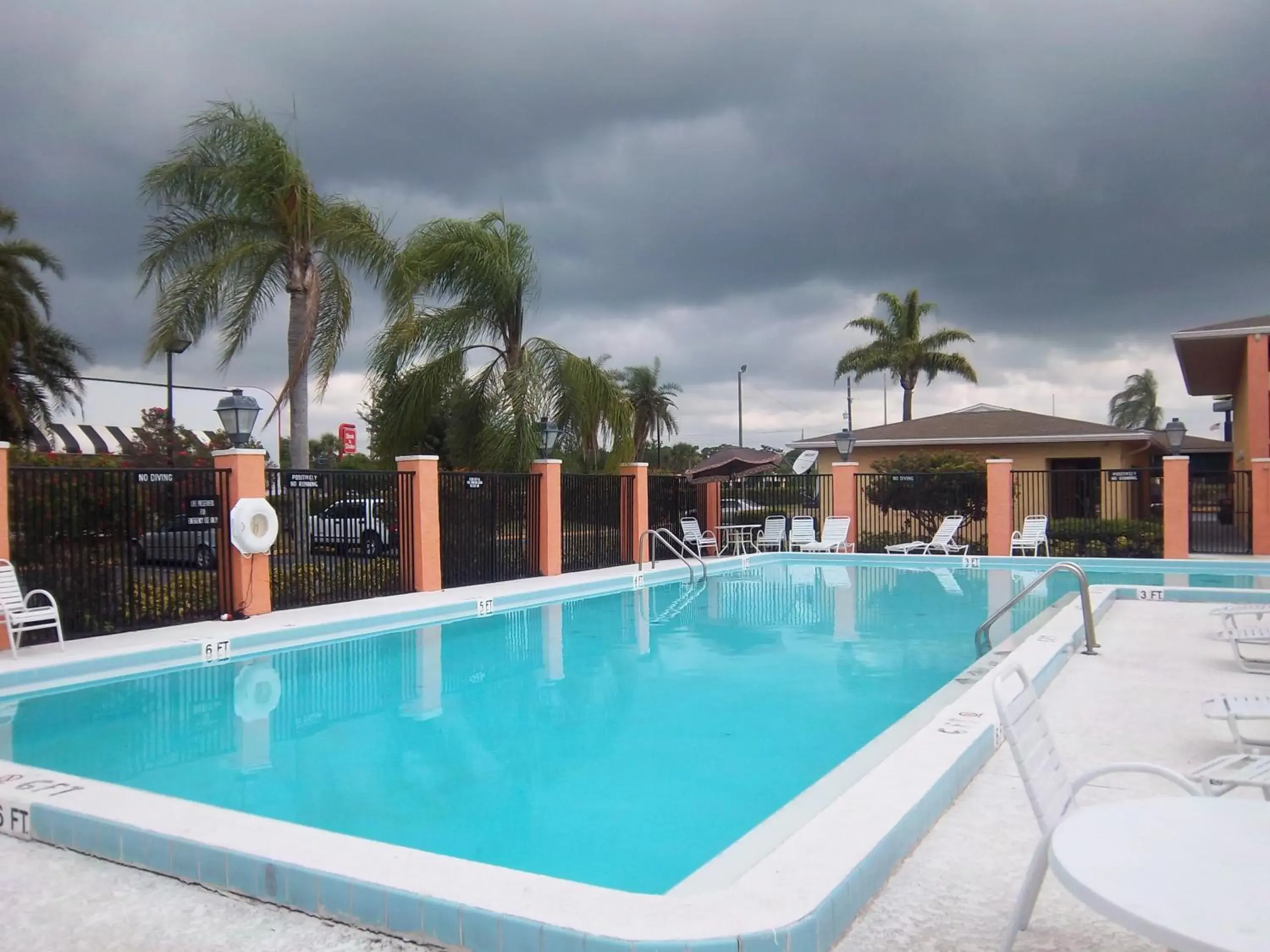 Swimming Pool in Americas Best Value Inn Florida Turnpike & I-95