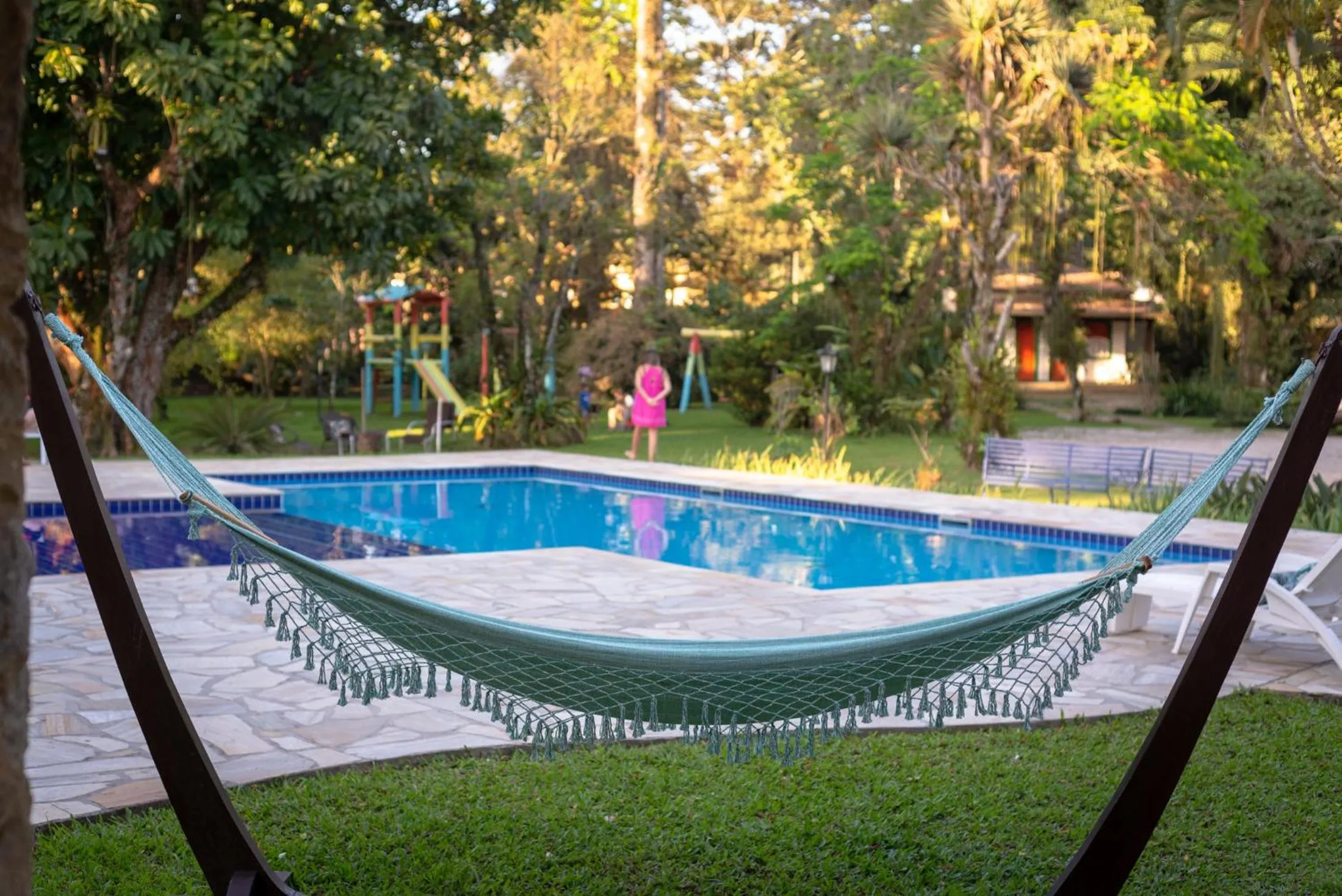 Swimming pool in Pousada Chácara Das Acácias