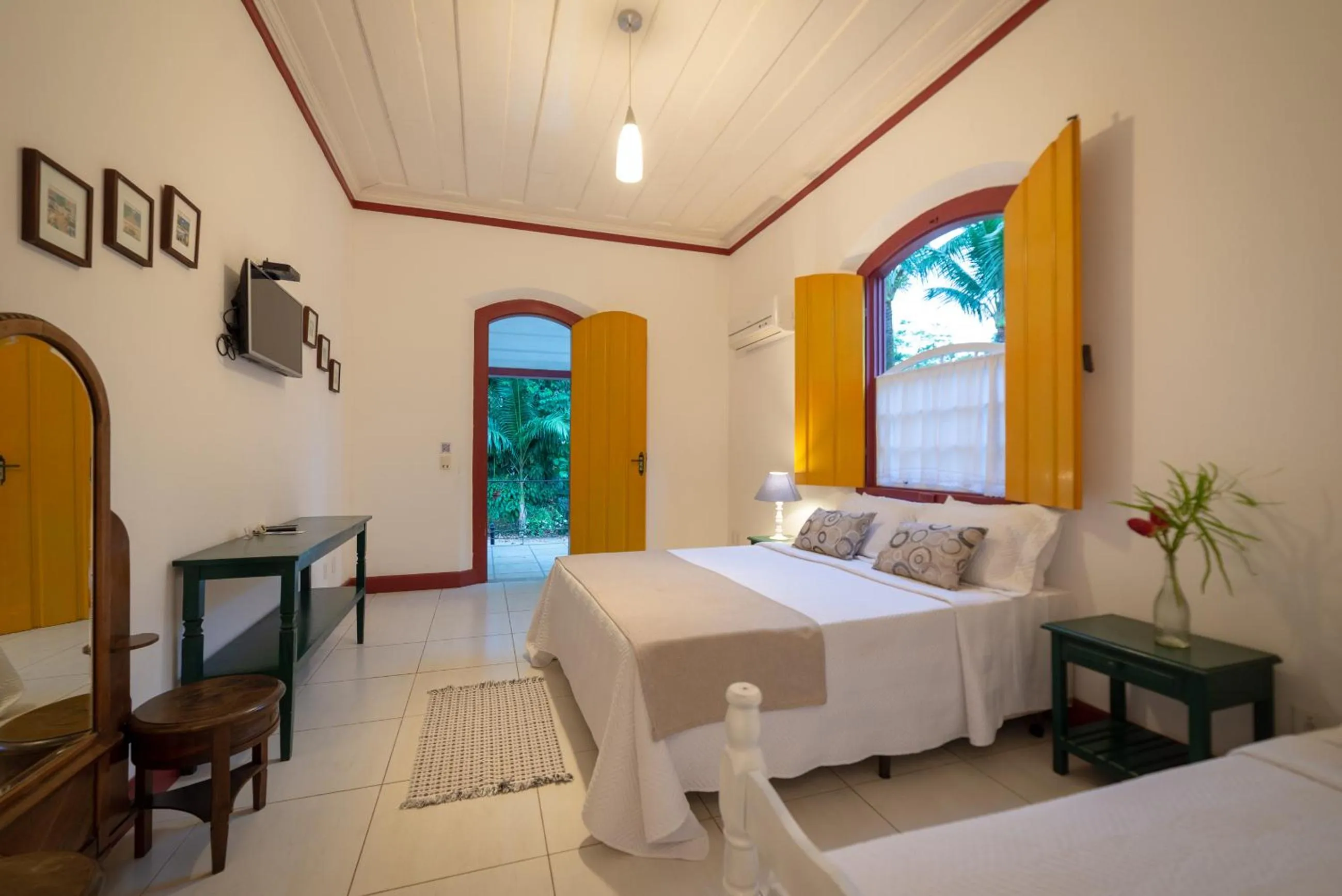 Bed in Pousada Chácara Das Acácias