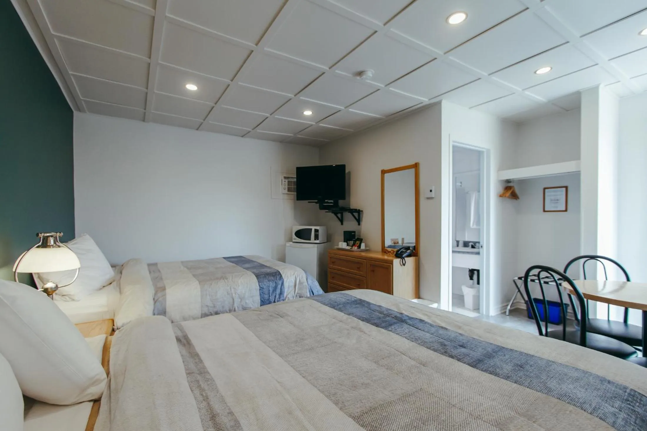 Bed in Motel Des Cascades