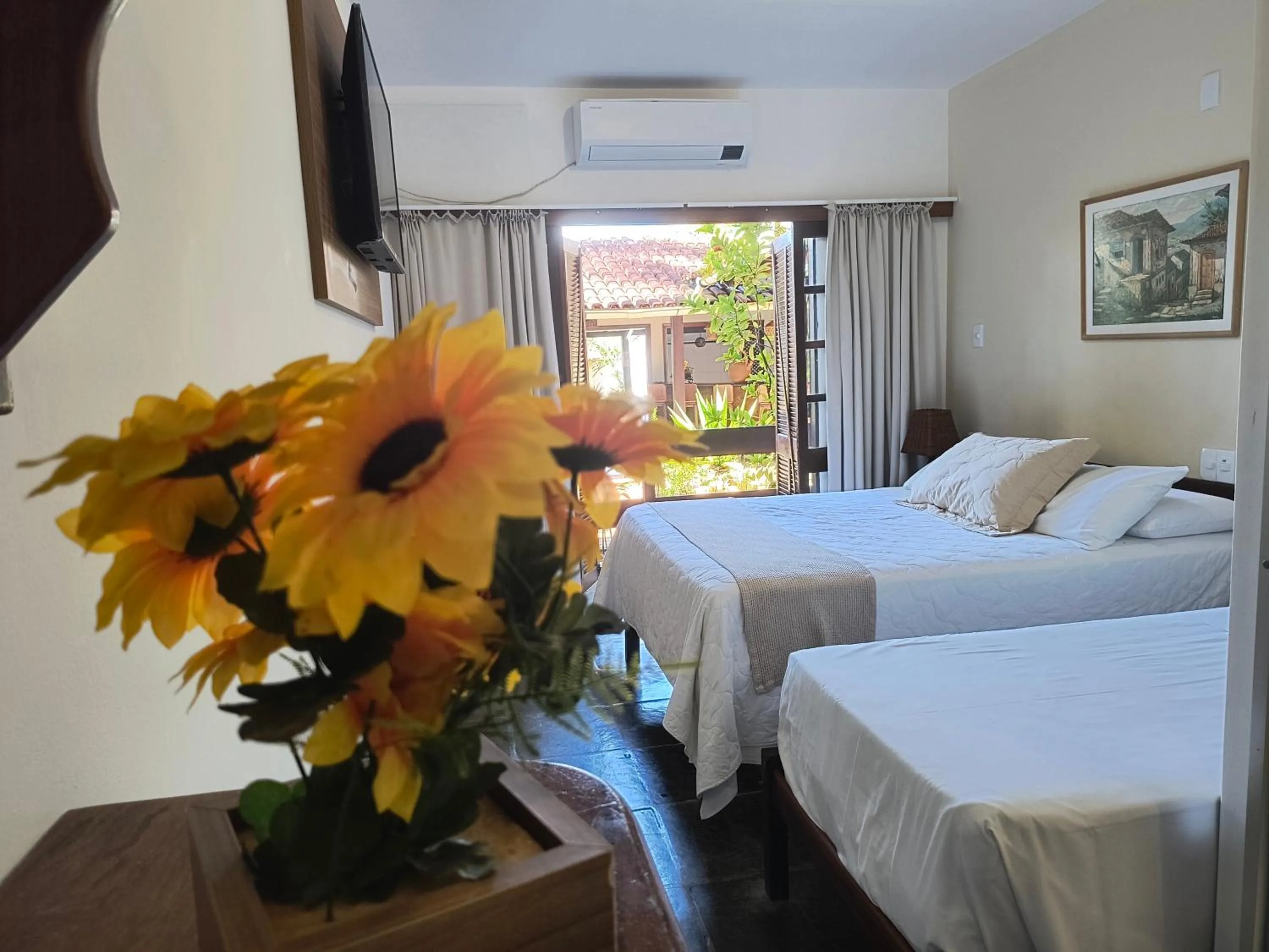 Bed in Pousada Guaratiba