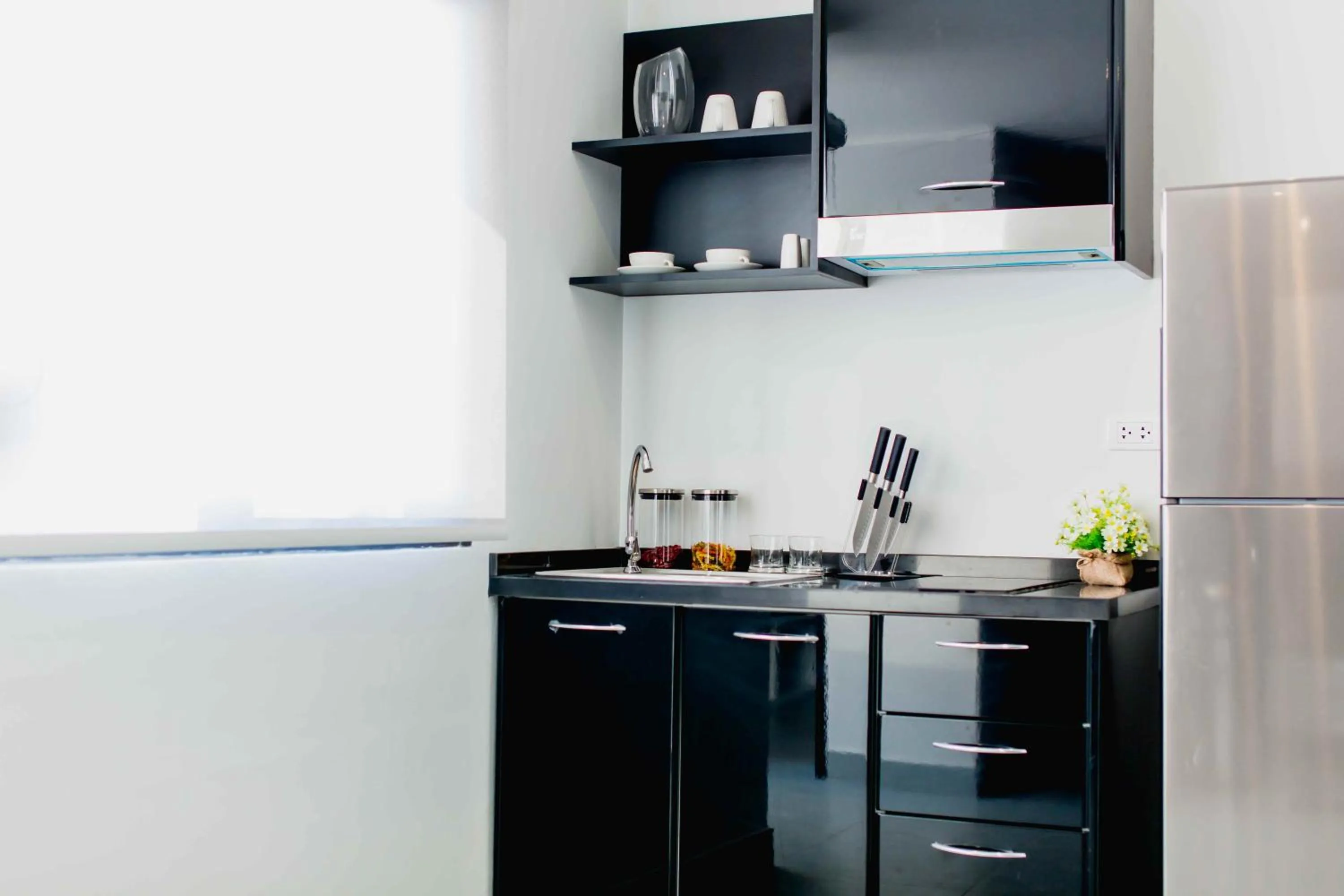 Kitchen or kitchenette in NOON Village Tower 1