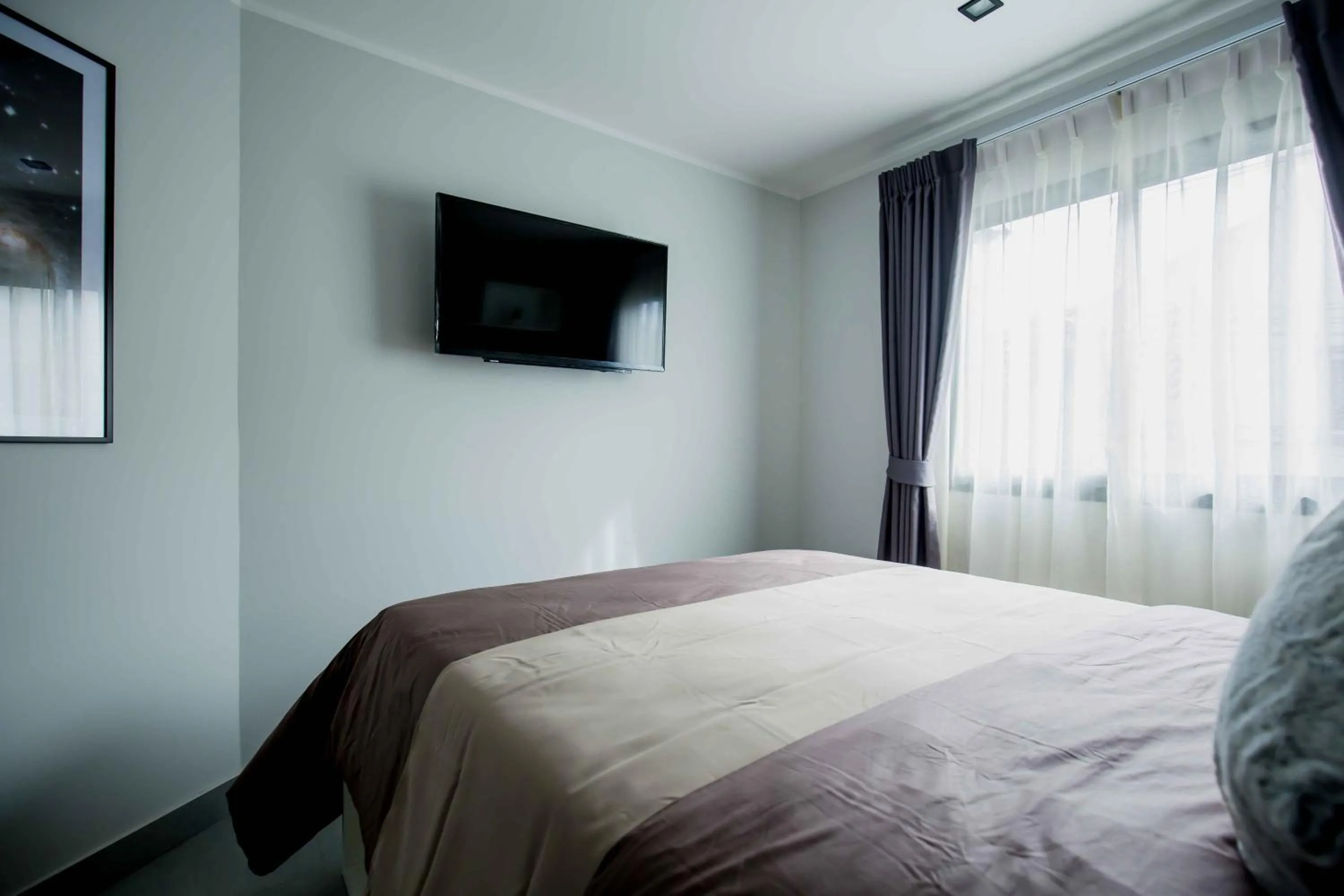 Bed in NOON Village Tower 1