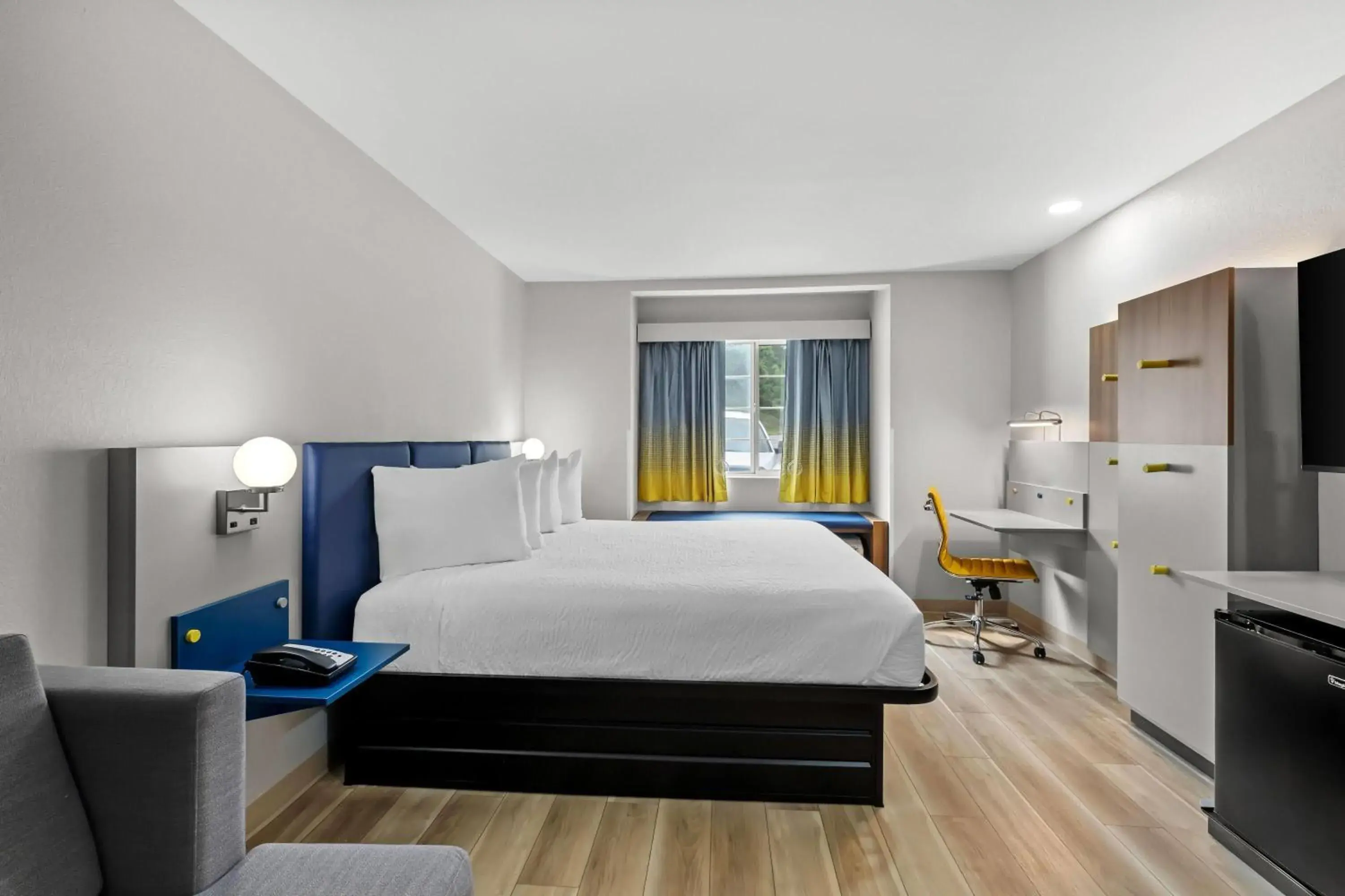 Bed in Microtel Inn & Suites by Wyndham Norcross Bed in Microtel Inn & Suites by Wyndham Norcross