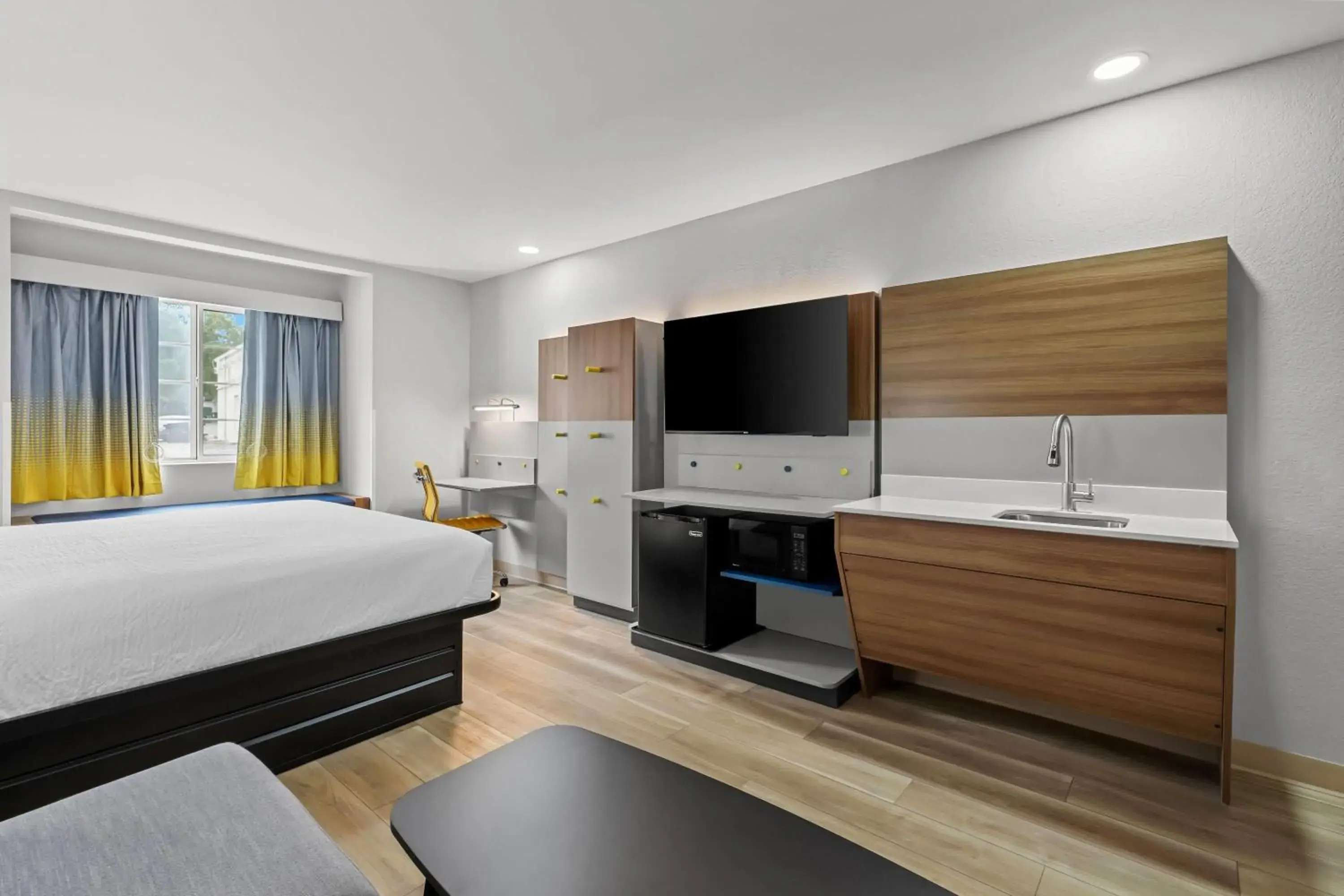 Bed in Microtel Inn & Suites by Wyndham Norcross Bed in Microtel Inn & Suites by Wyndham Norcross