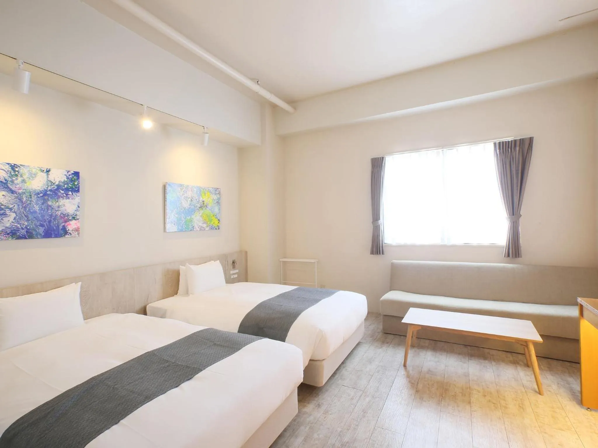 Photo of the whole room, Bed in Ishigakijima Hotel Cucule