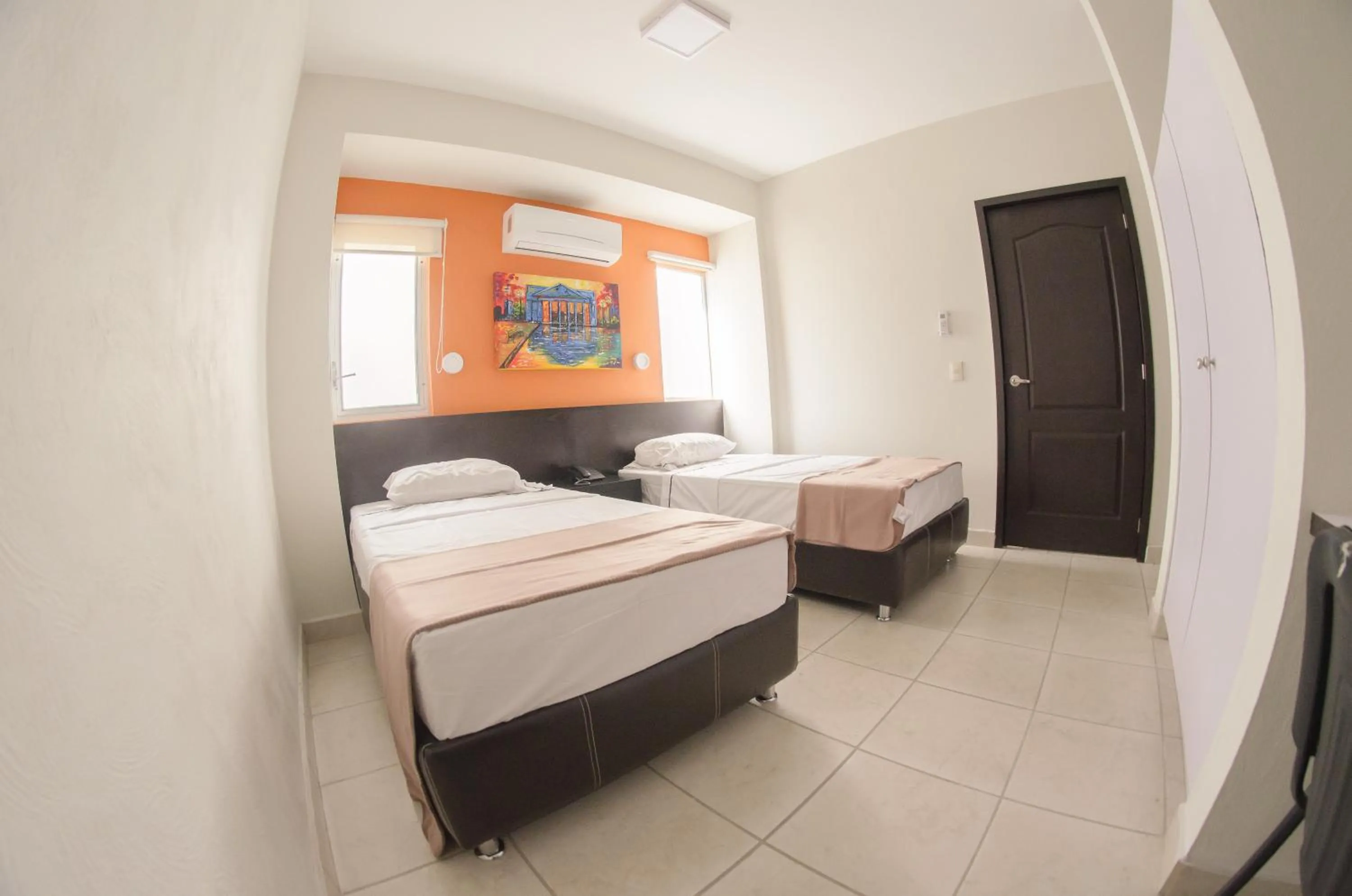 Bed in Hotel Belisario INN