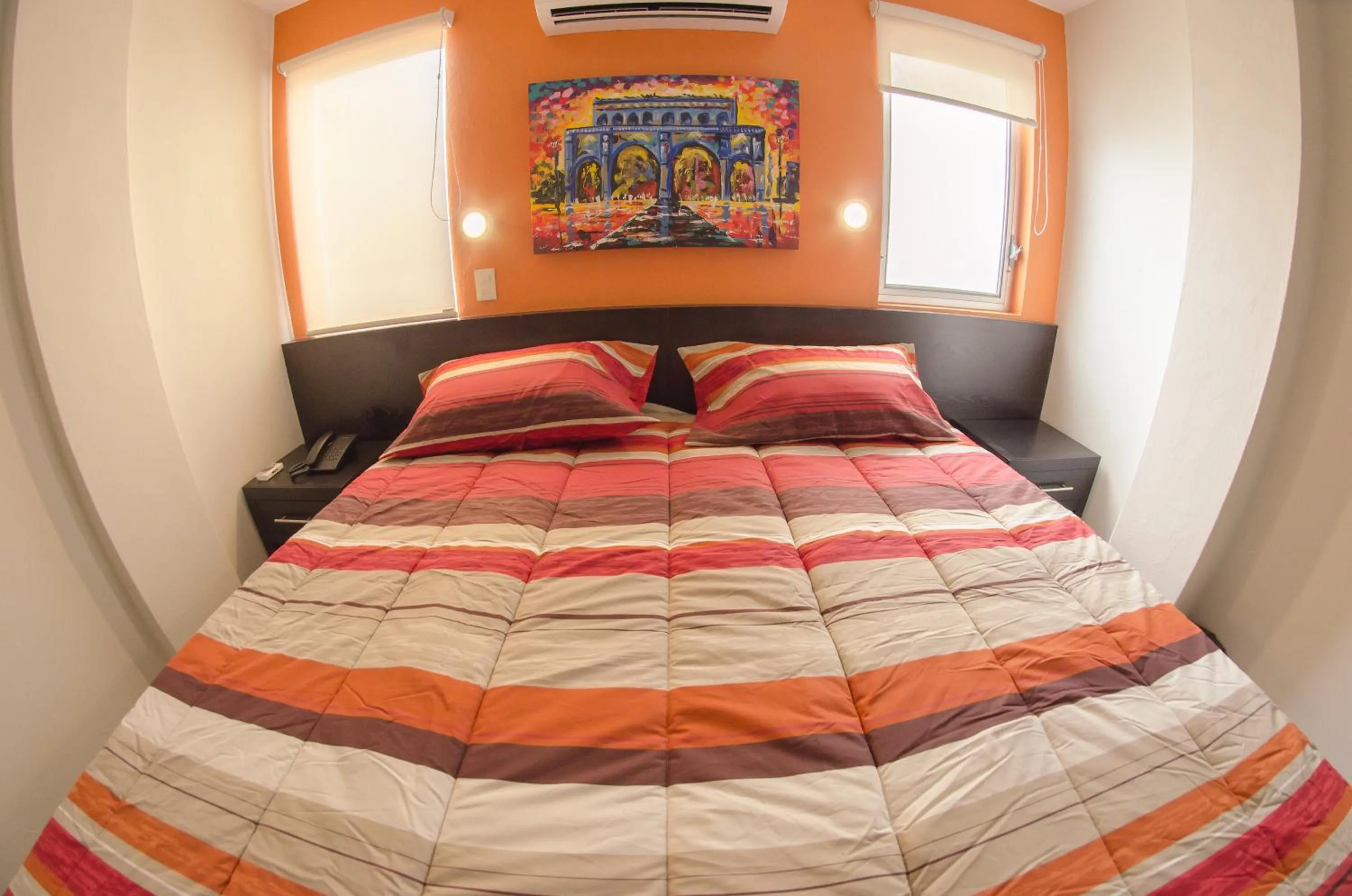 Bed in Hotel Belisario INN