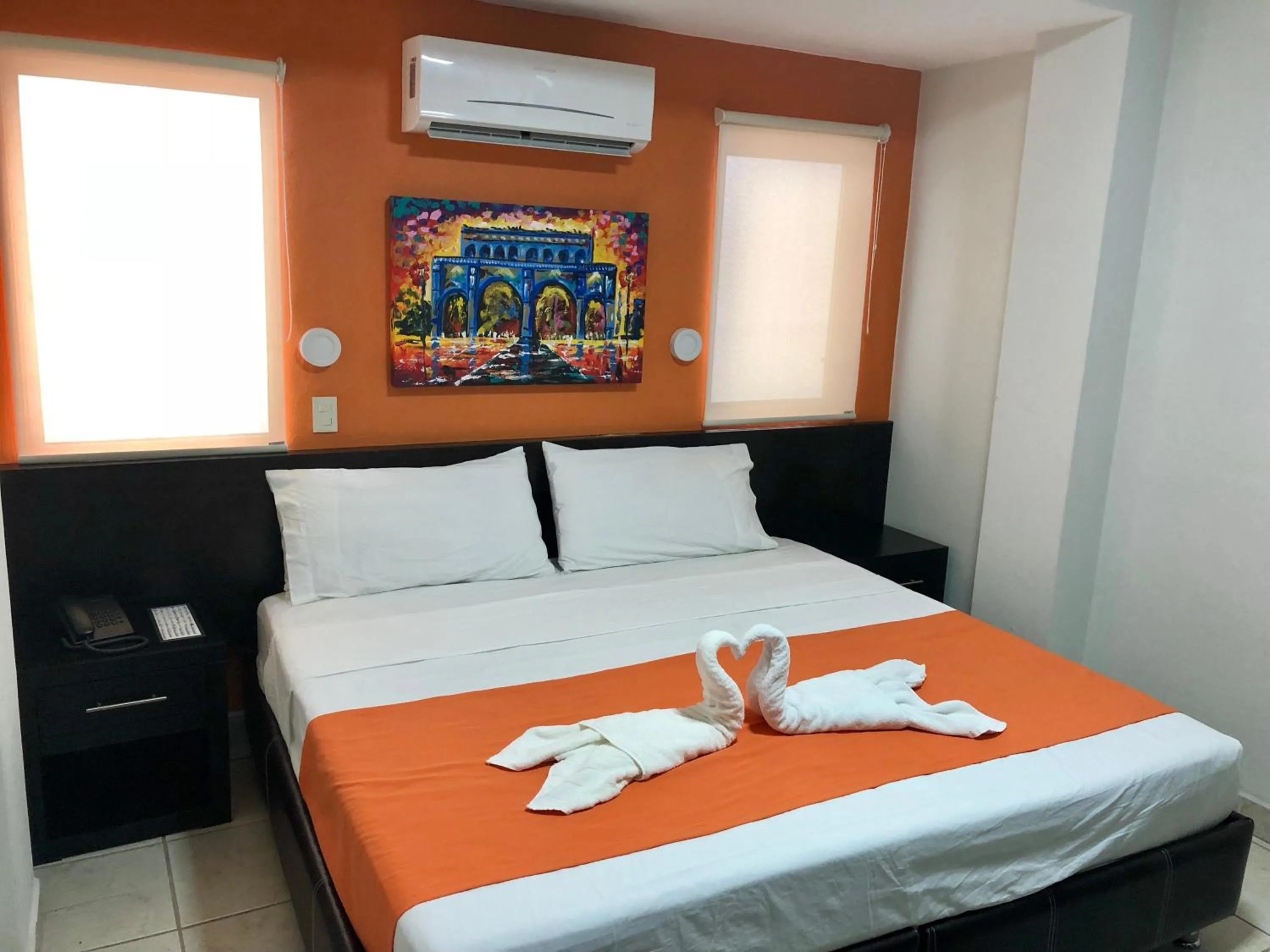 Bed in Hotel Belisario INN