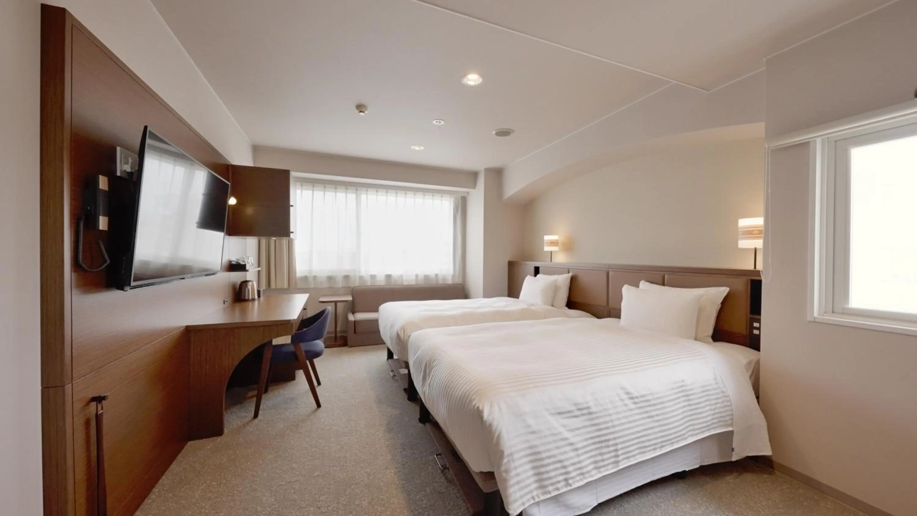 Bed in Hotel Palm Royal Resort Kokusai Street