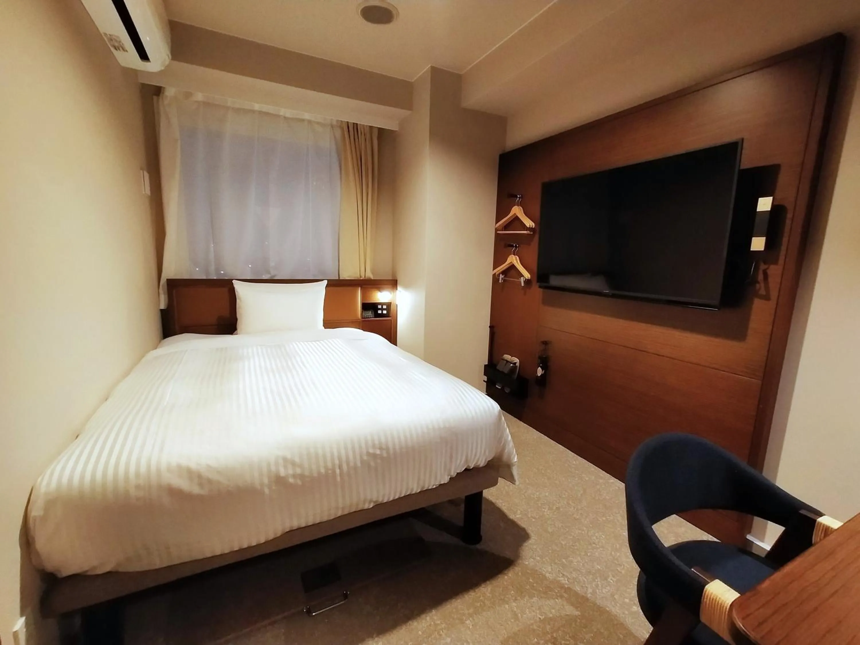 Bed in Hotel Palm Royal Resort Kokusai Street