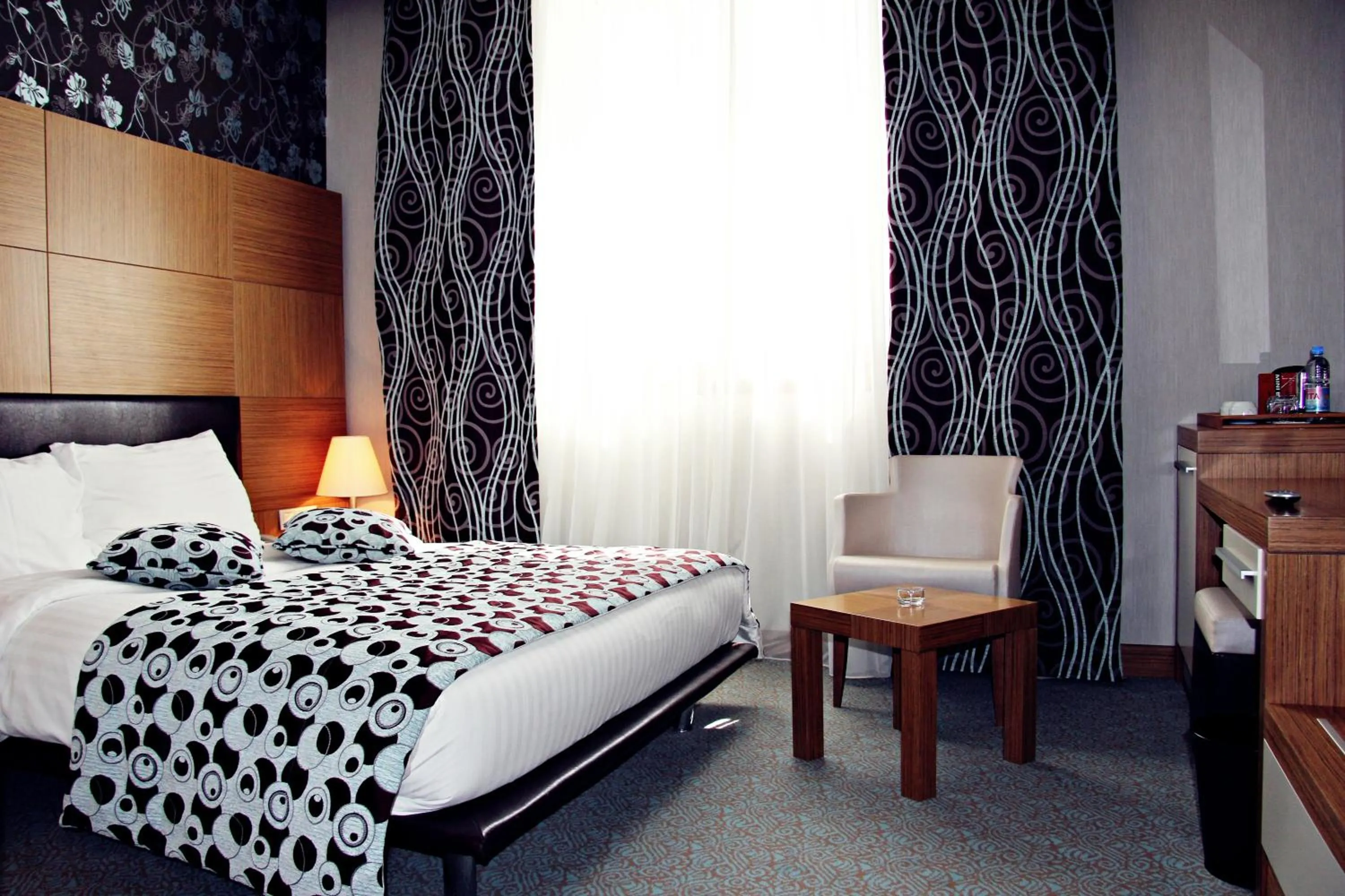 Bed in Grand Nur Plaza Hotel