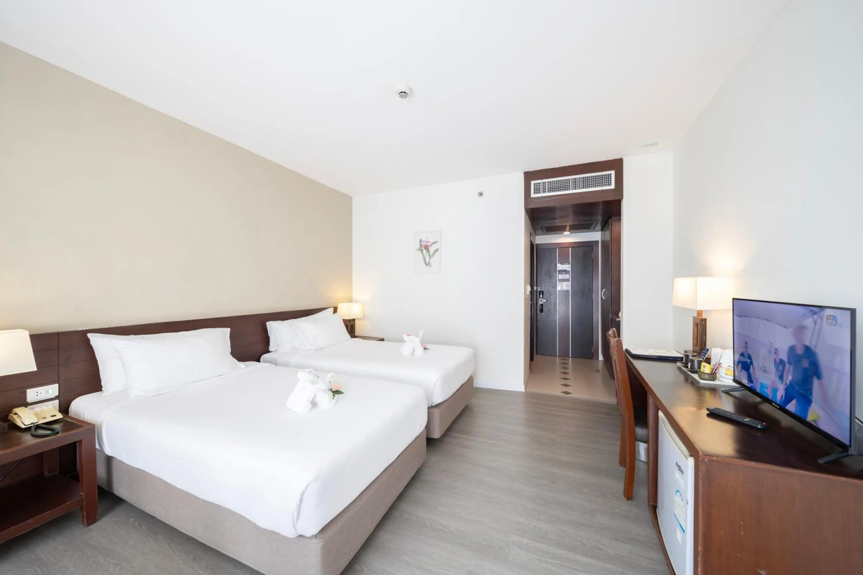 Bed in Golden Crown Grand Hotel