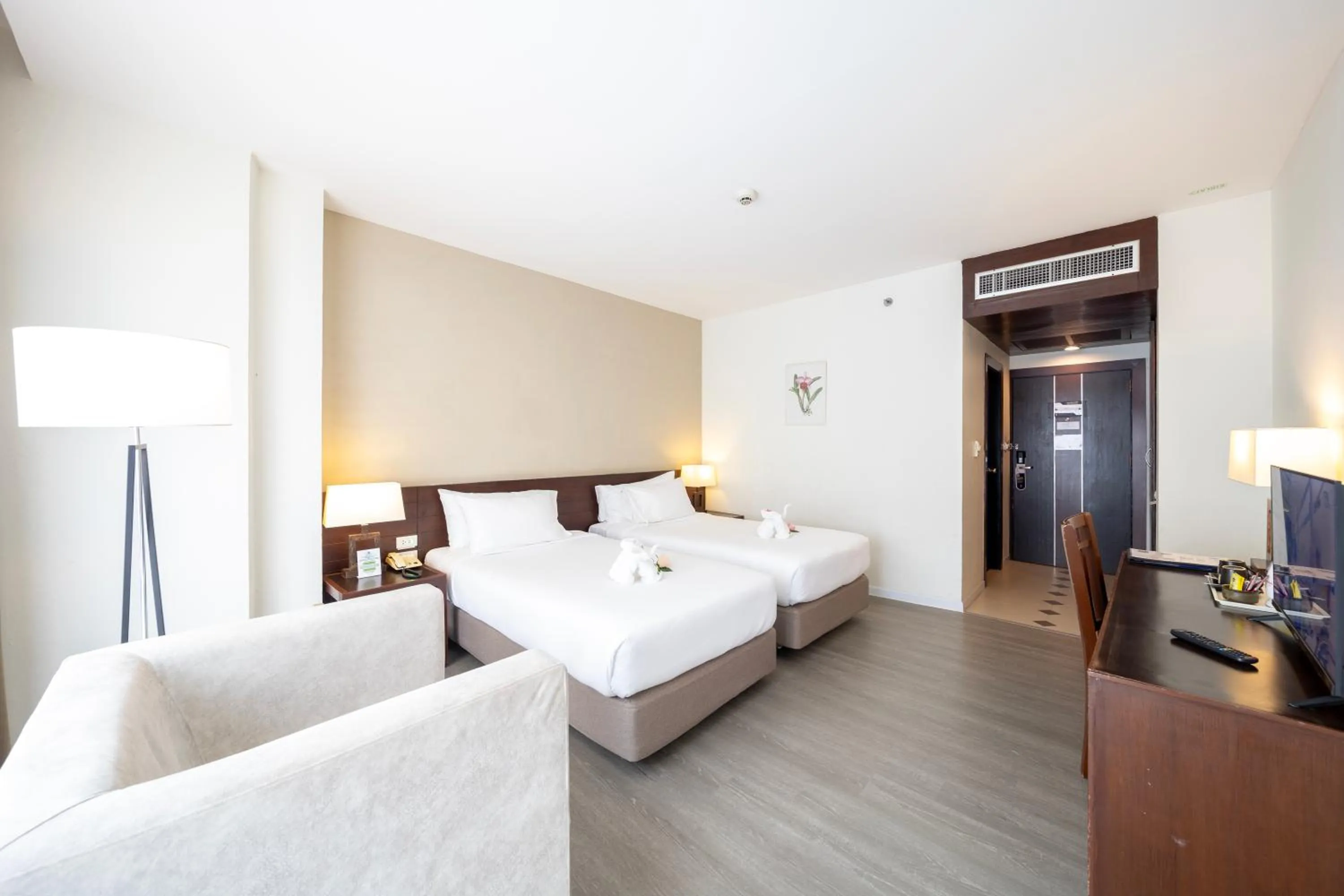 Bed in Golden Crown Grand Hotel