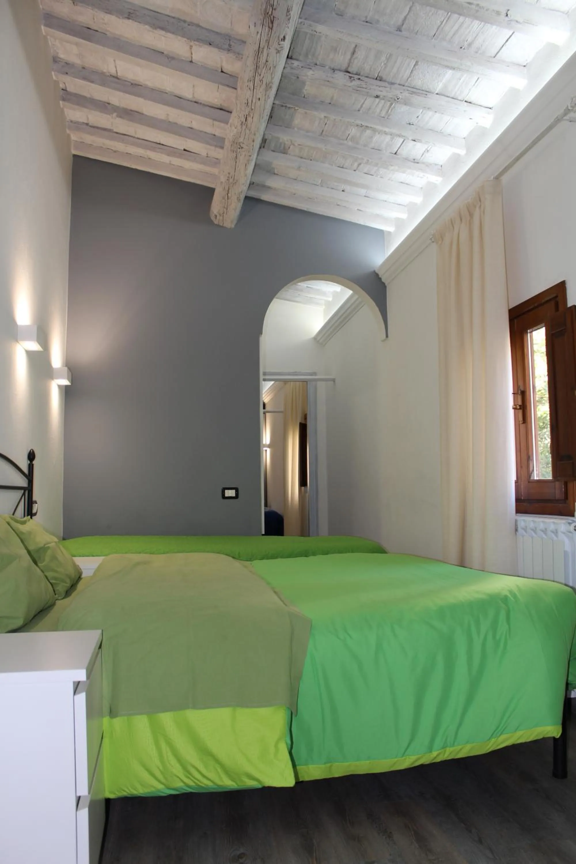 Bed in Max Apartments