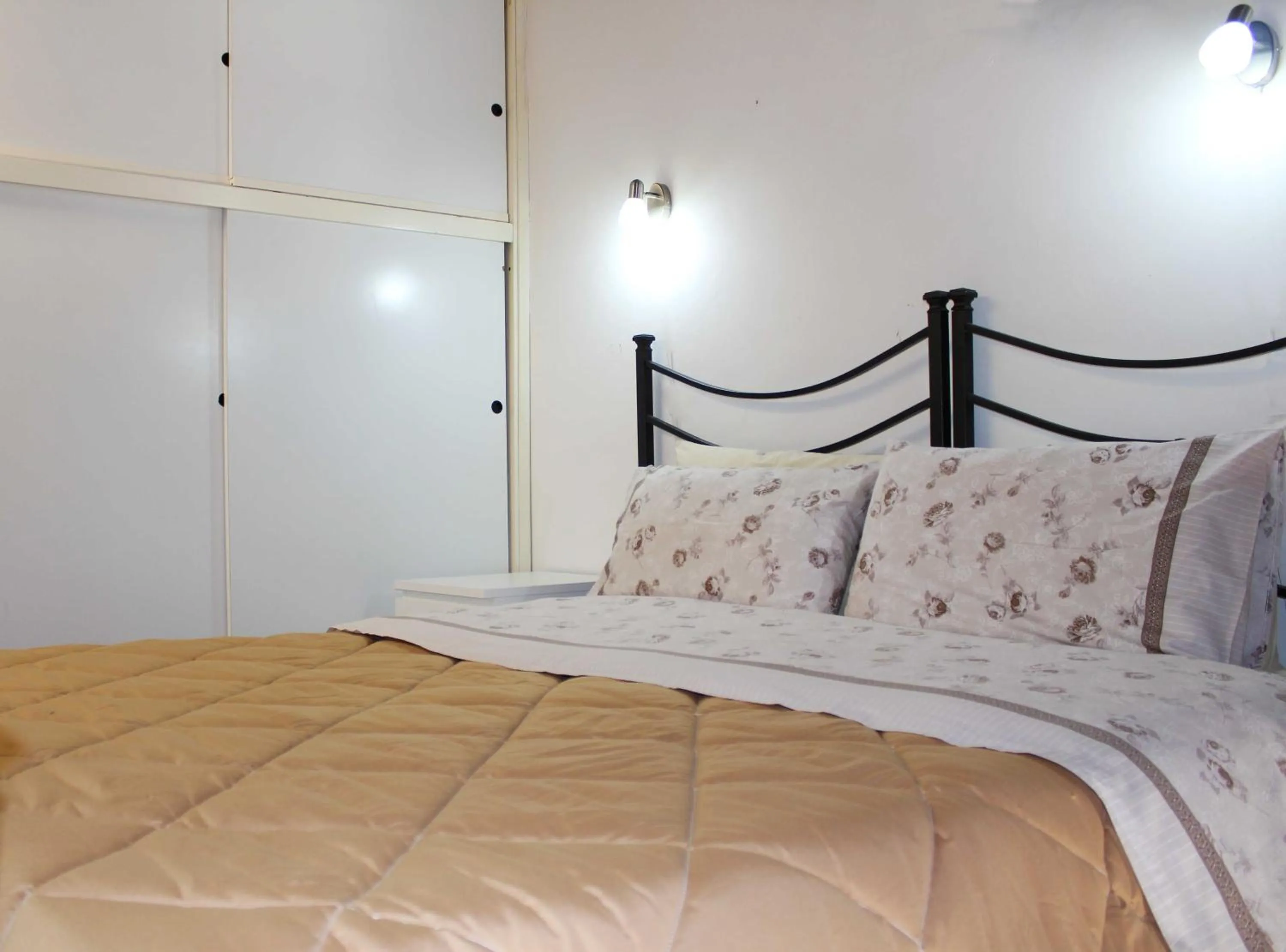 Bed in Max Apartments