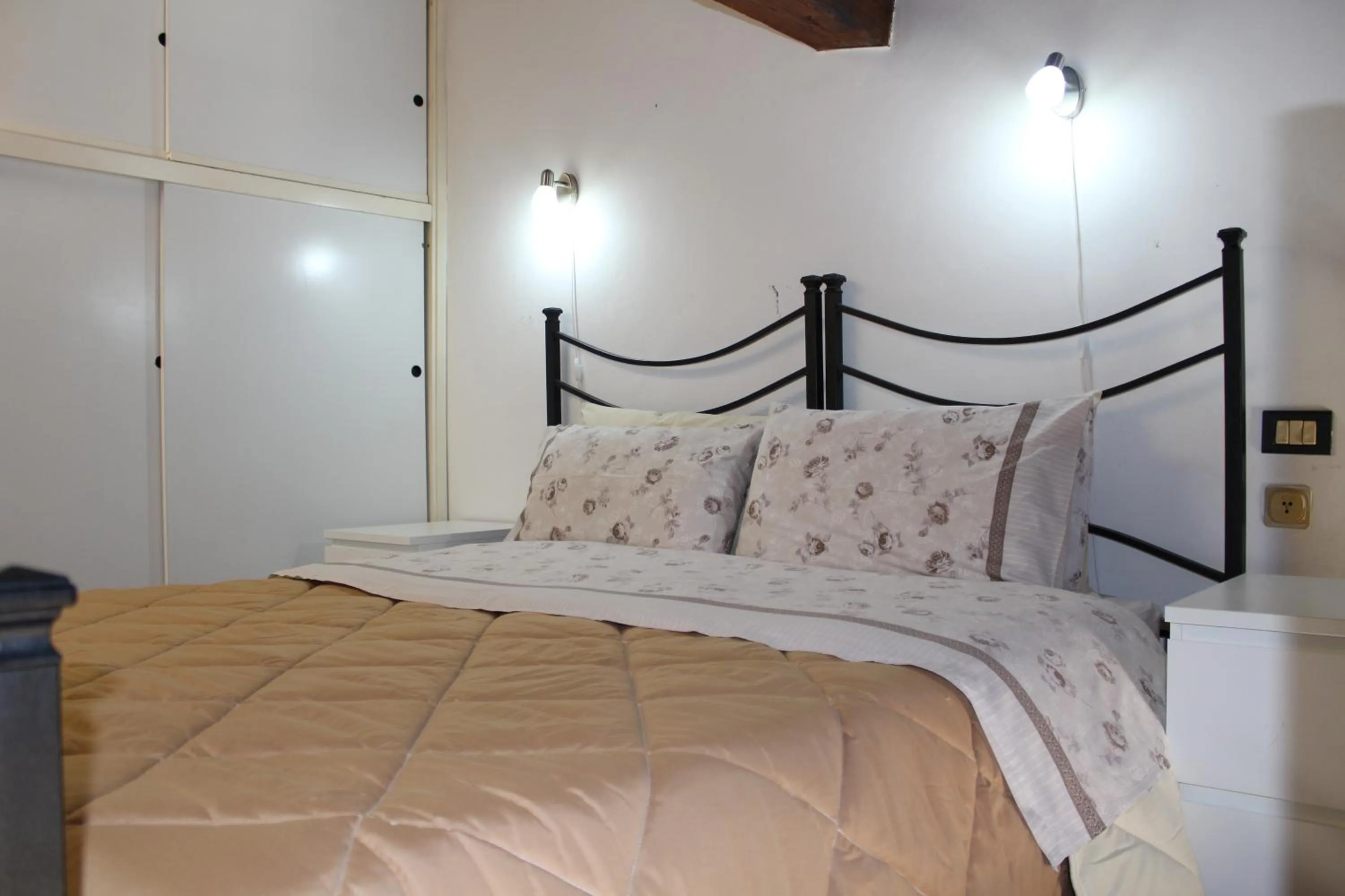 Bed in Max Apartments