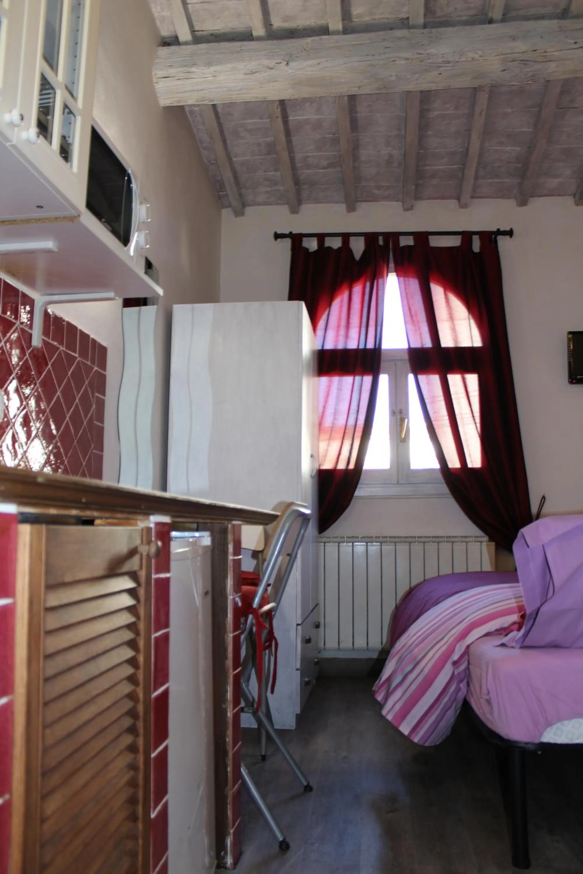 Bed in Max Apartments