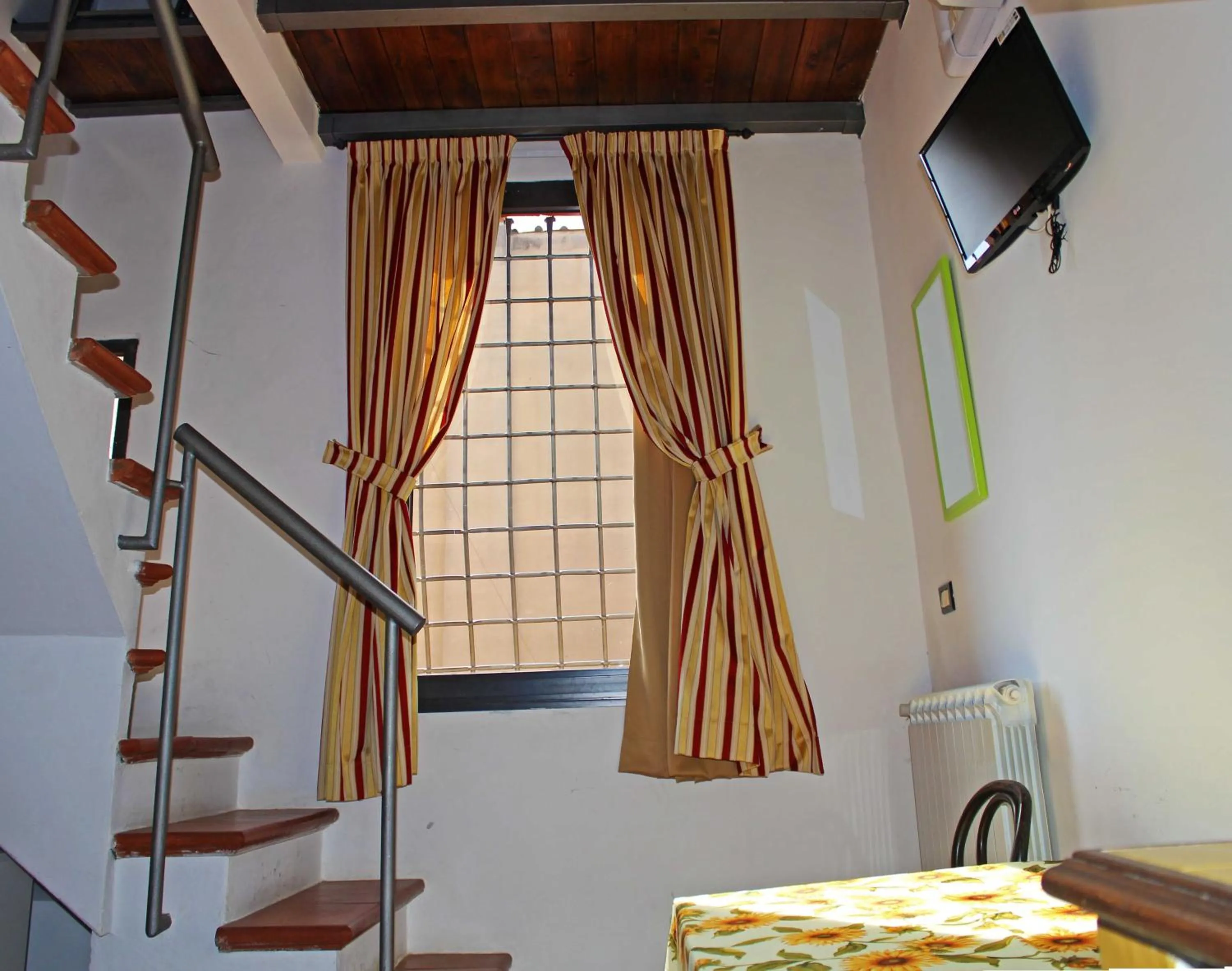 Decorative detail, TV/Entertainment Center in Max Apartments