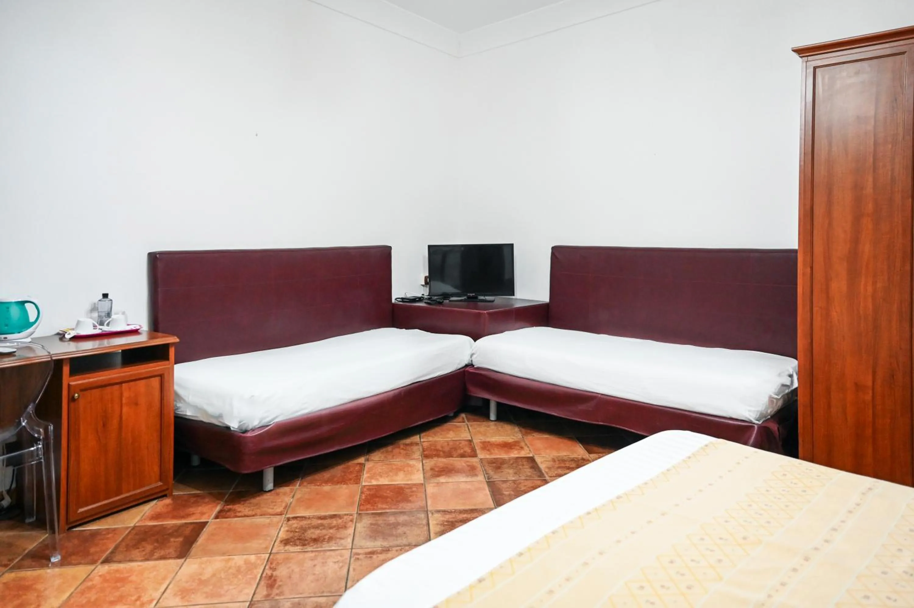 Bed in Hotel Palazzo Krataiis