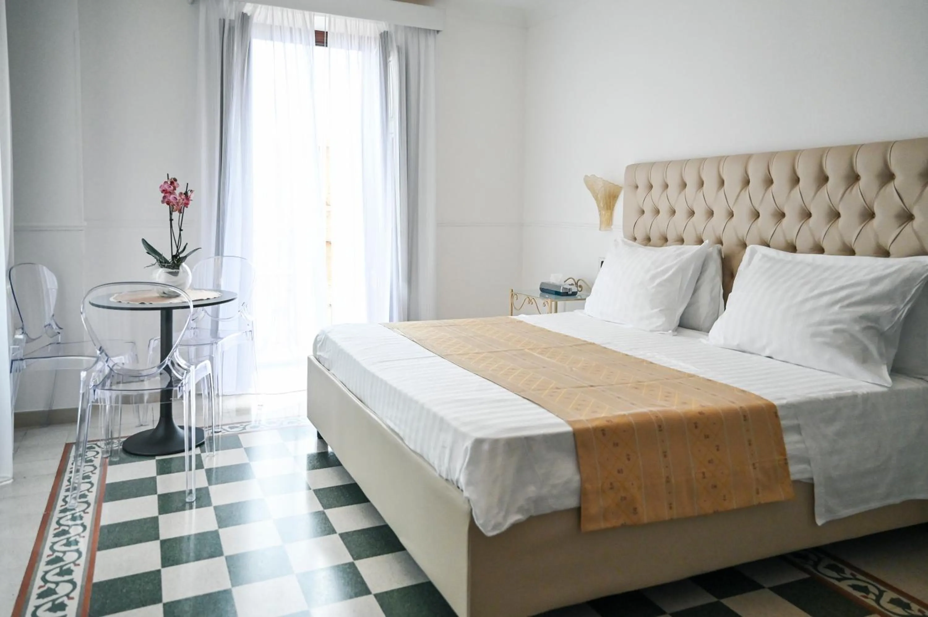 Bed in Hotel Palazzo Krataiis