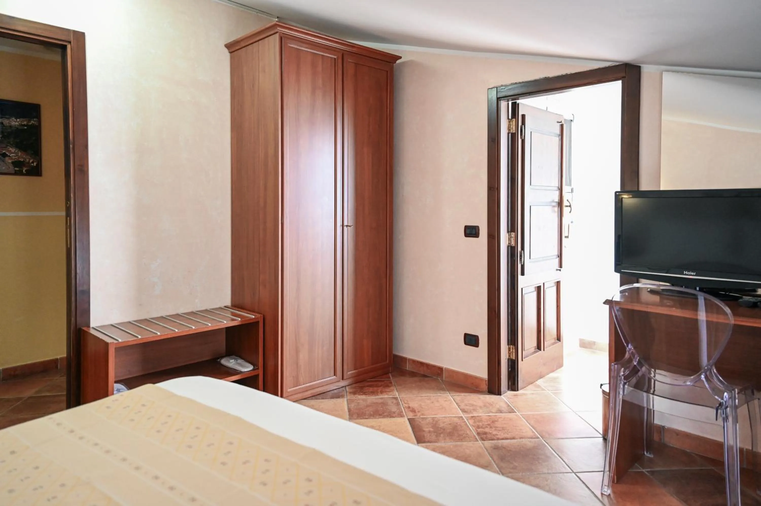 Bed in Hotel Palazzo Krataiis
