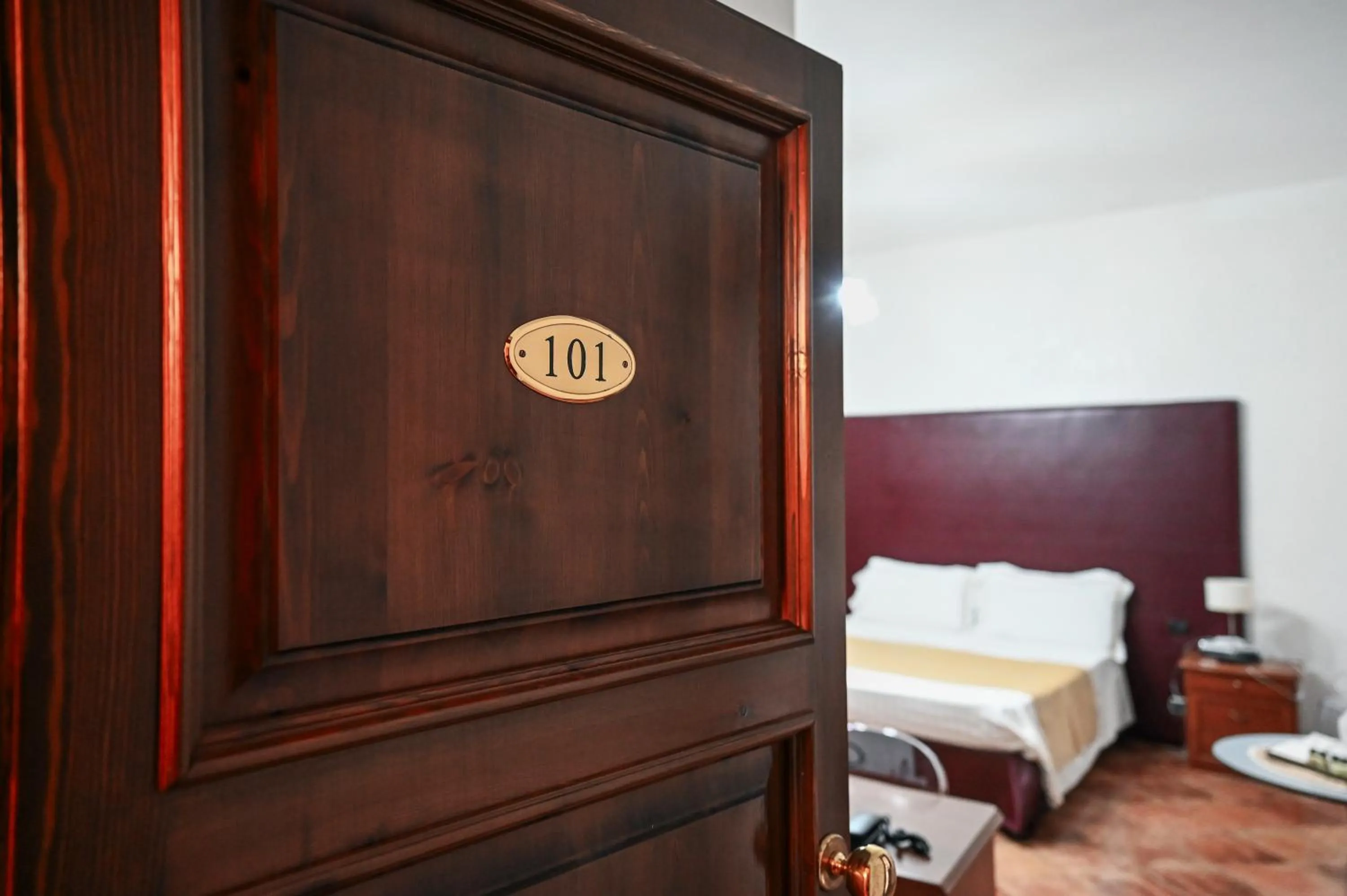 Bed in Hotel Palazzo Krataiis